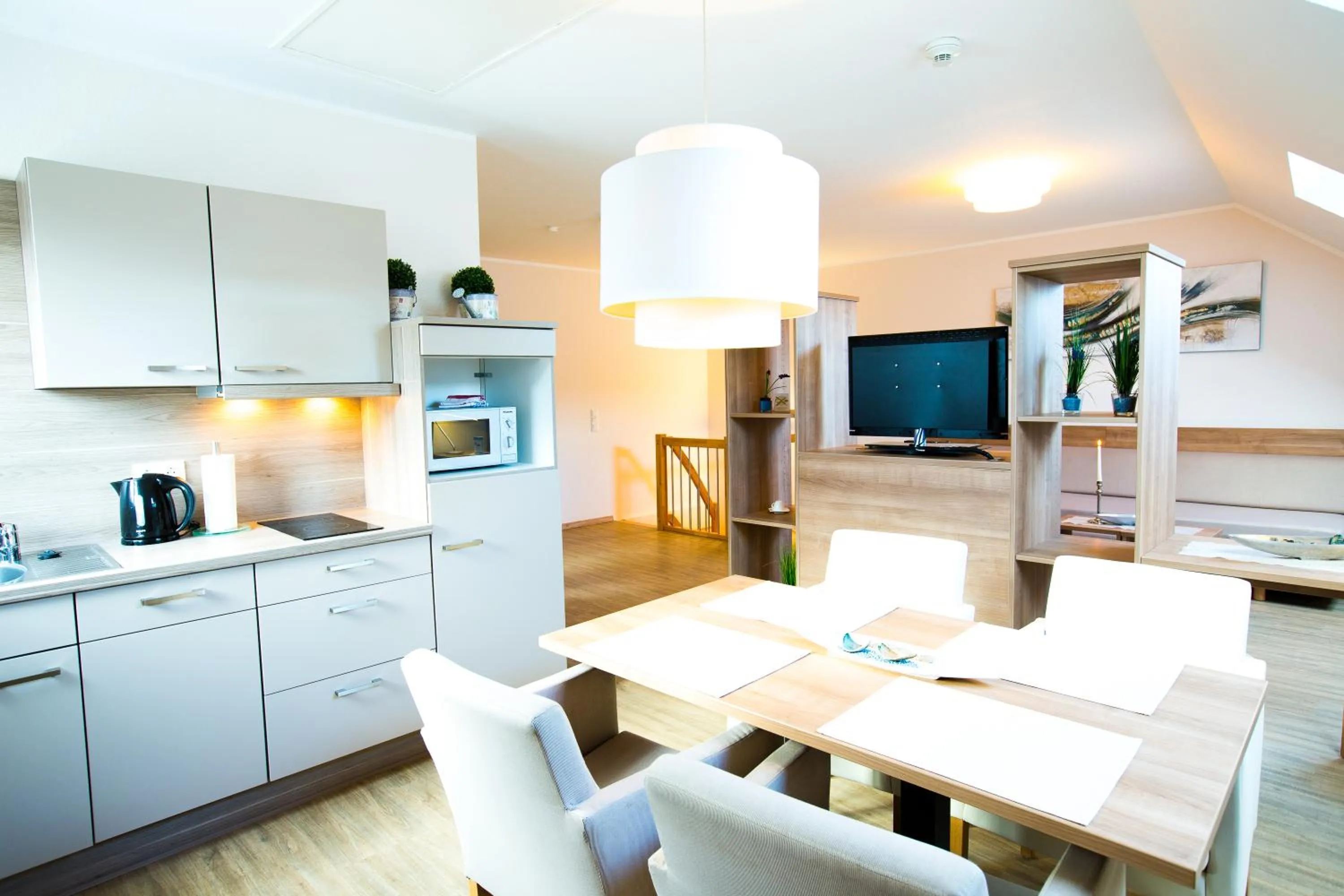 Kitchen or kitchenette in Hotel & Living Am Wartturm - Hotel & Apartments