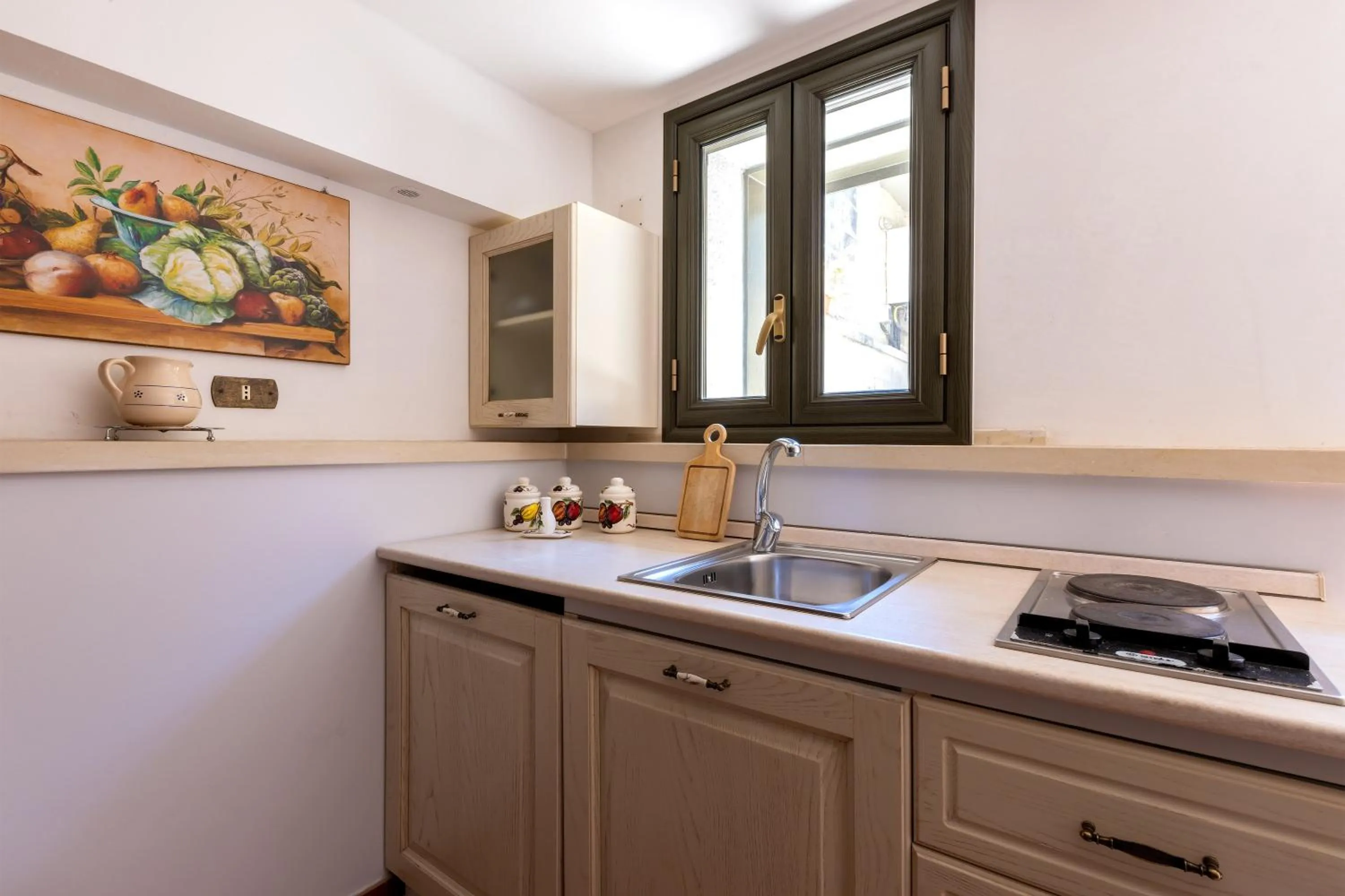 Kitchen or kitchenette in Casa Ulmi con piscina