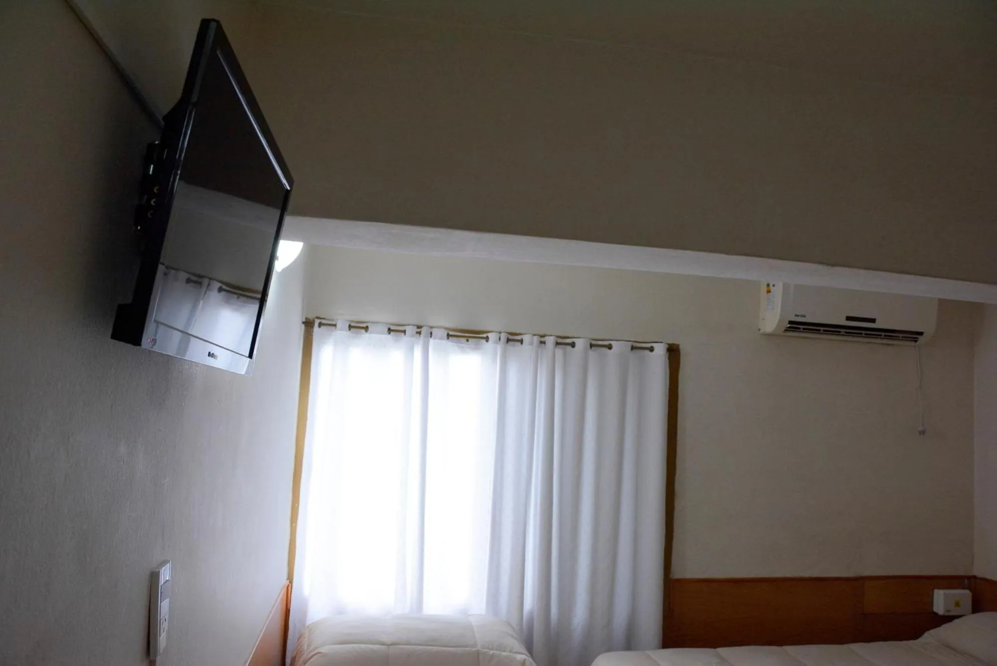 Bed in Hotel Menossi