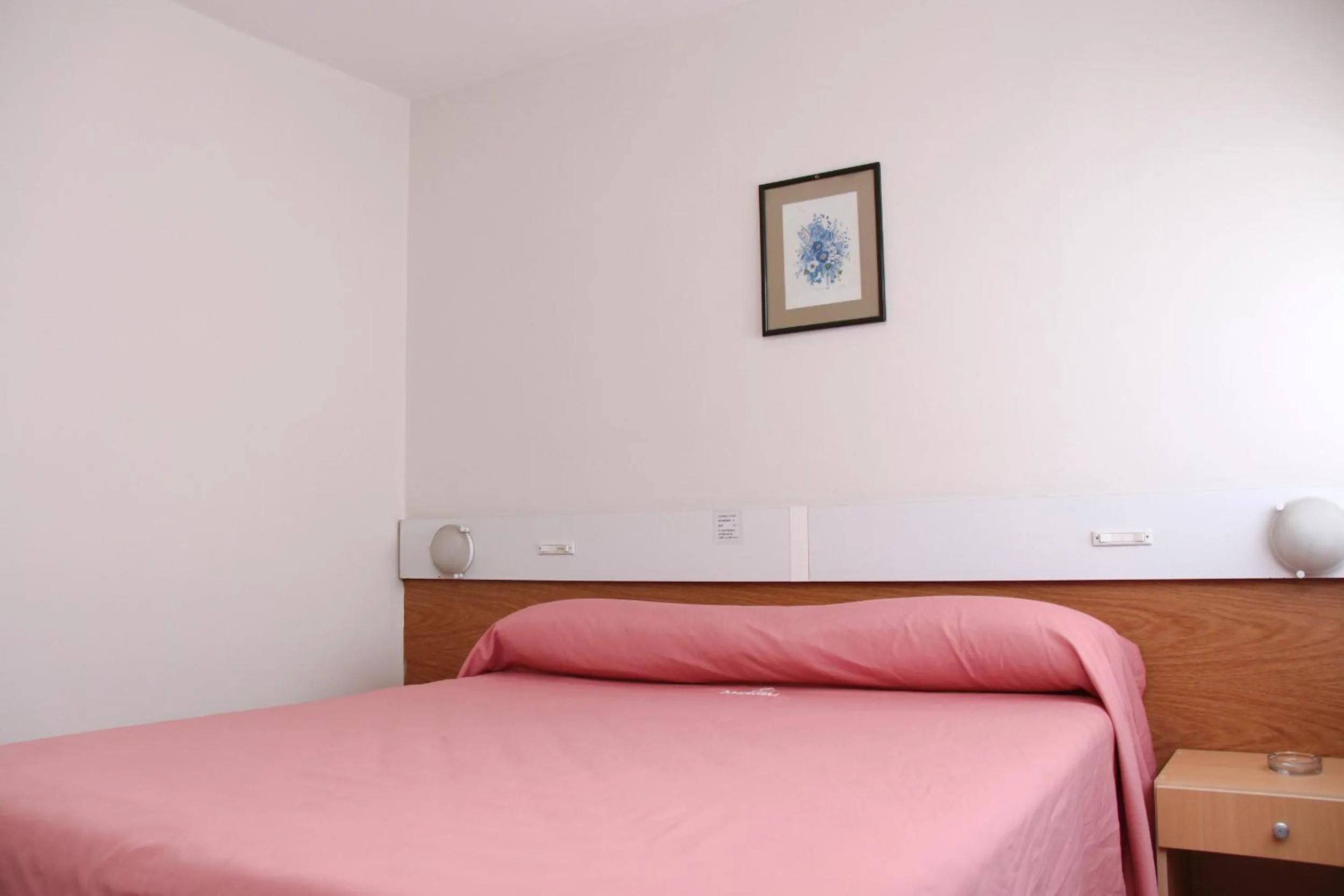 Bed in Hotel Menossi