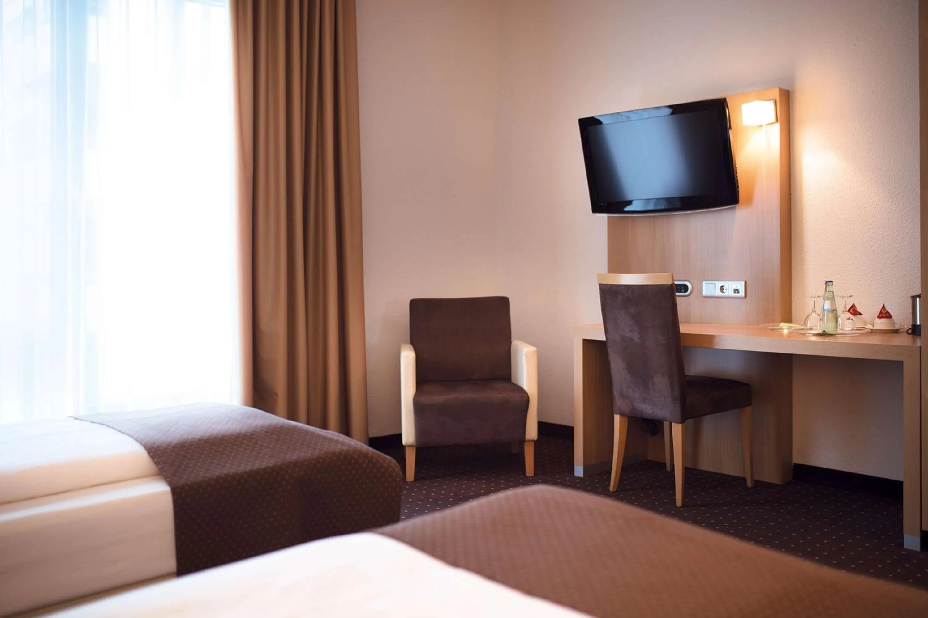 Photo of the whole room, Bed in Lanzcarré Hotel Mannheim, a member of Radisson Individuals