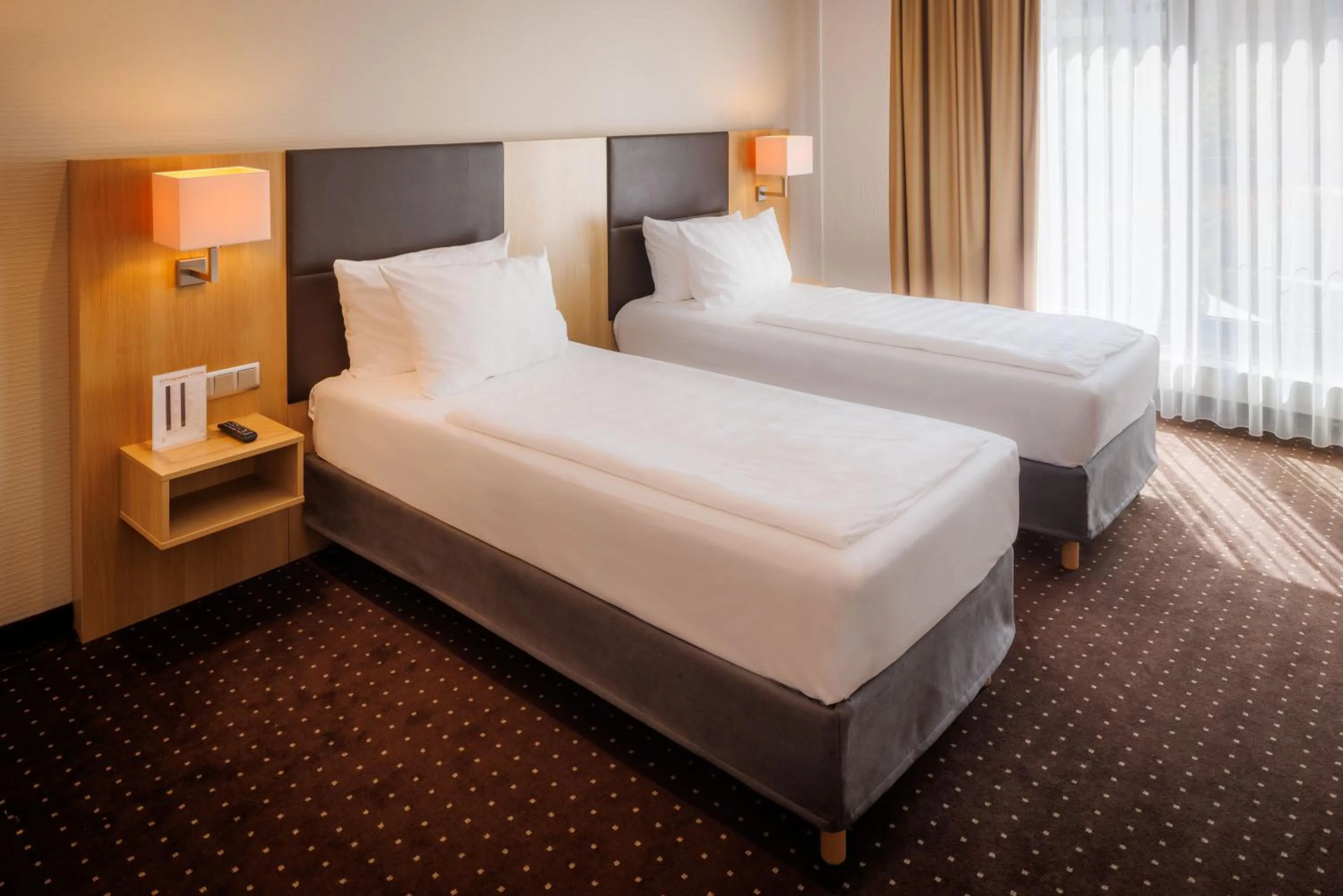 Bedroom, Bed in Lanzcarré Hotel Mannheim, a member of Radisson Individuals