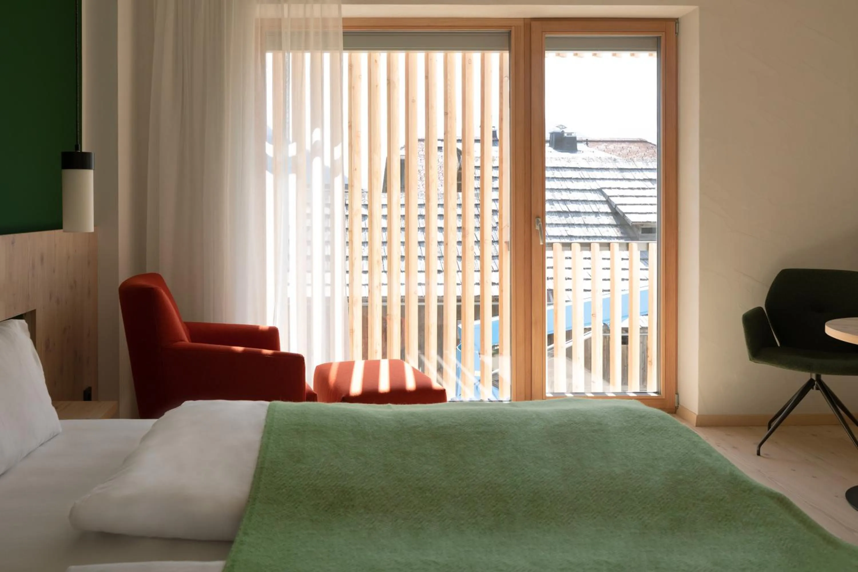 Seating area, Bed in Hotel Neusacherhof