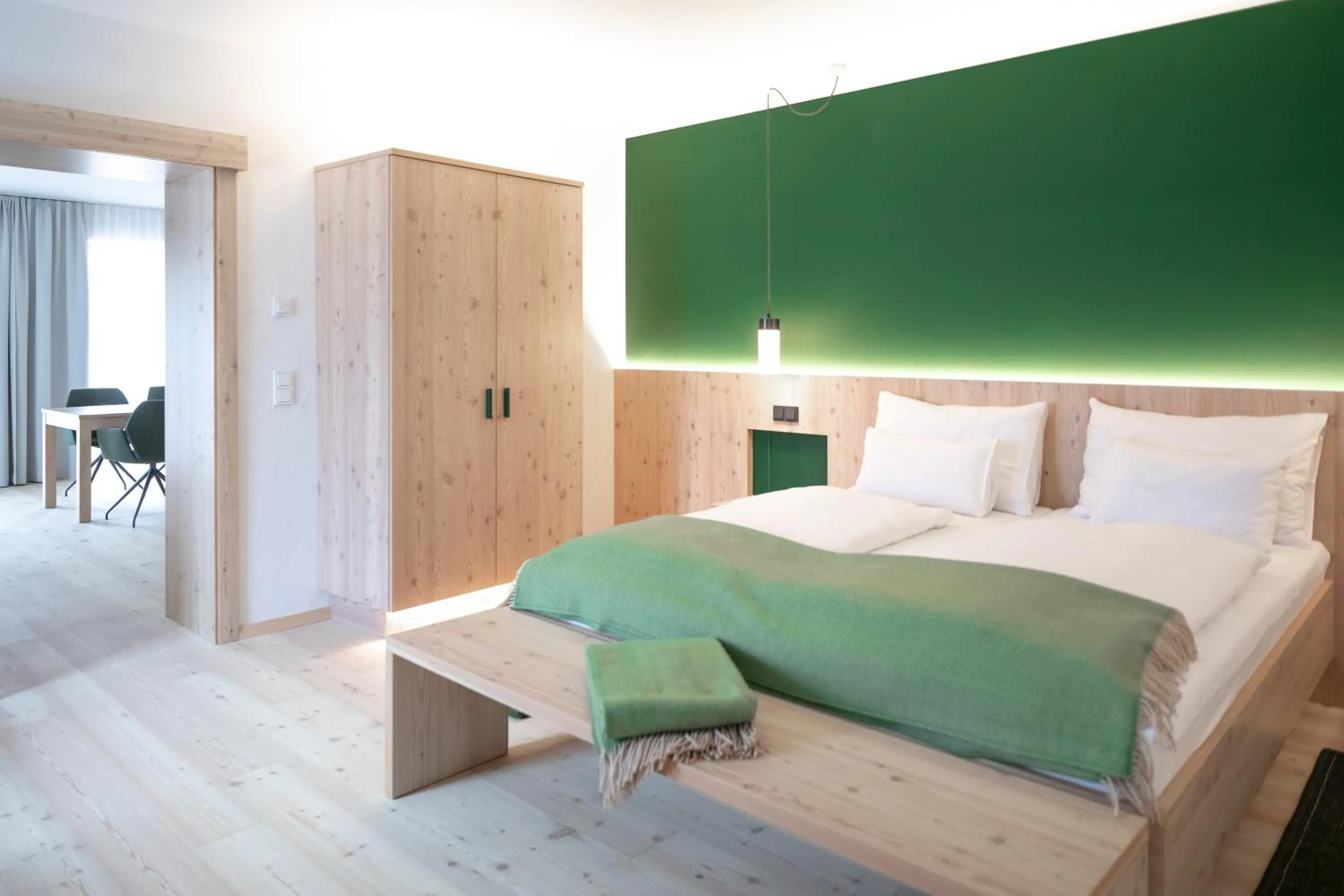 Living room, Bed in Hotel Neusacherhof