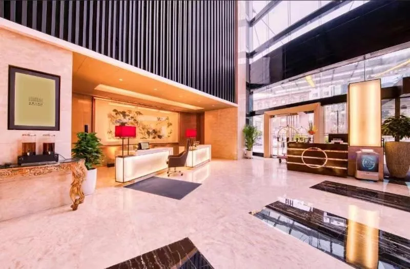 Lobby or reception in Enlux Hotel