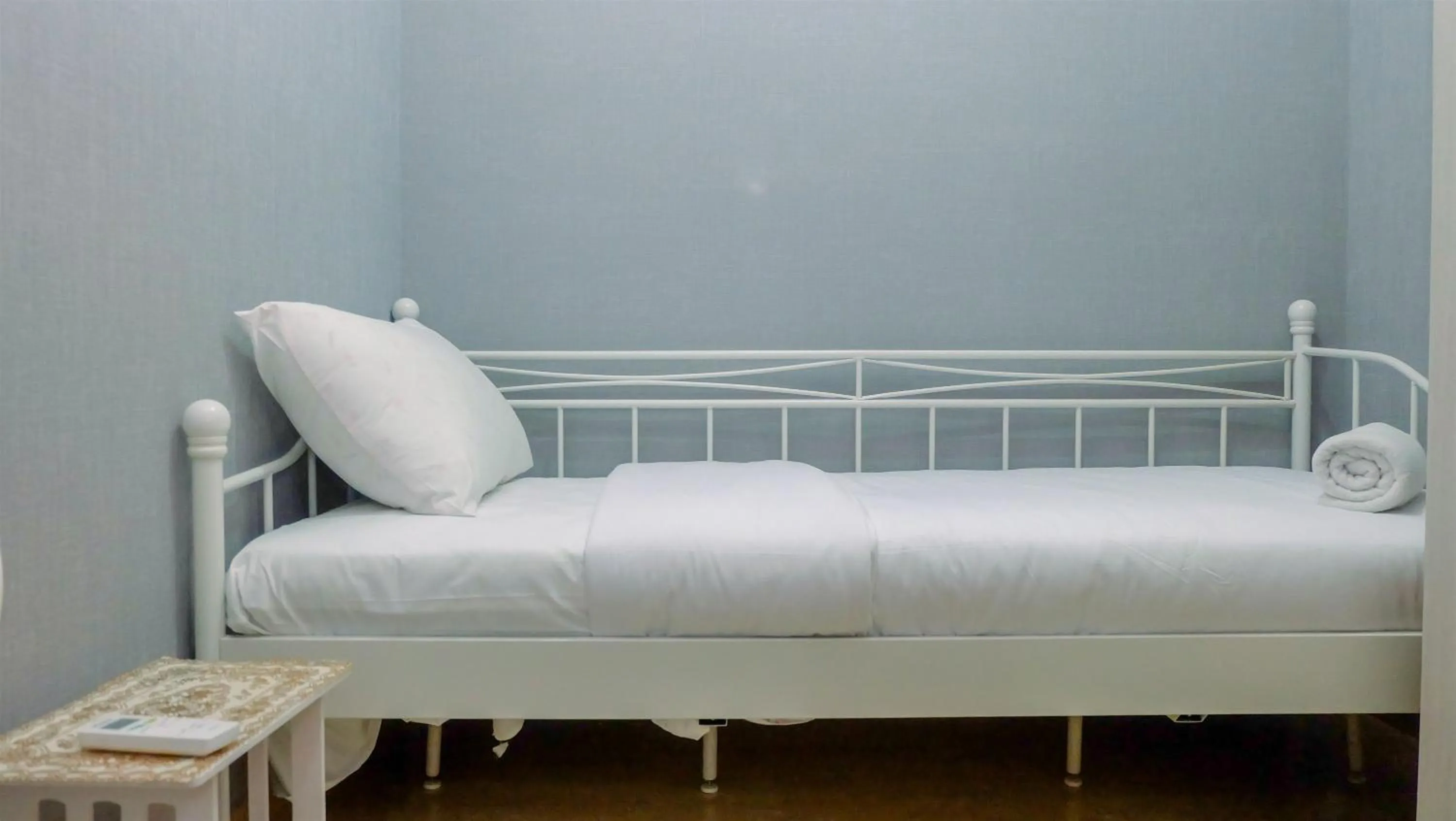 Bed in Classy 2BR Apartment at Menteng Park with City View By Travelio