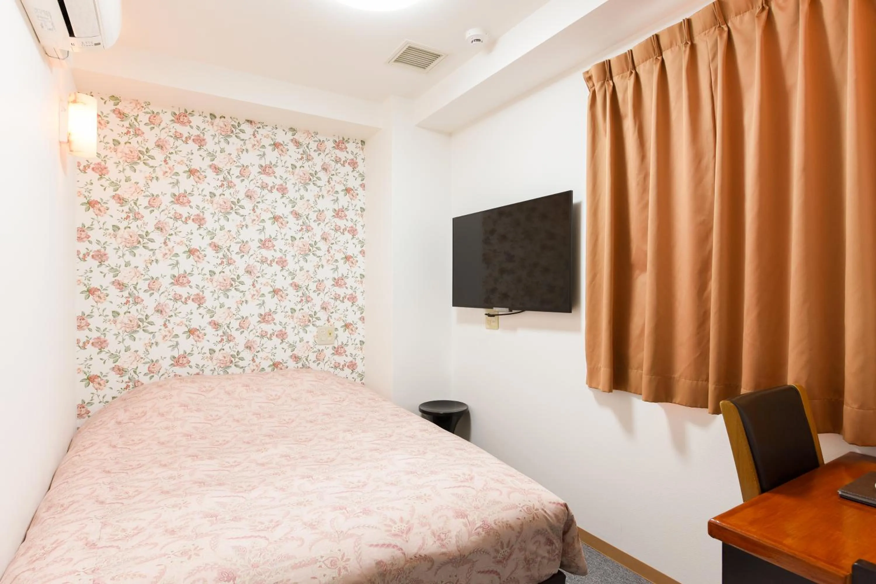 Bed in Otsuka Town Hotel