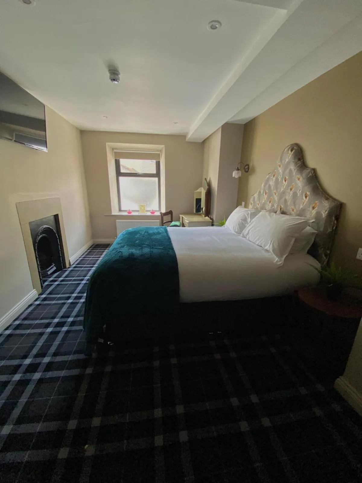 Bed in The Lounge Hotel & Bar