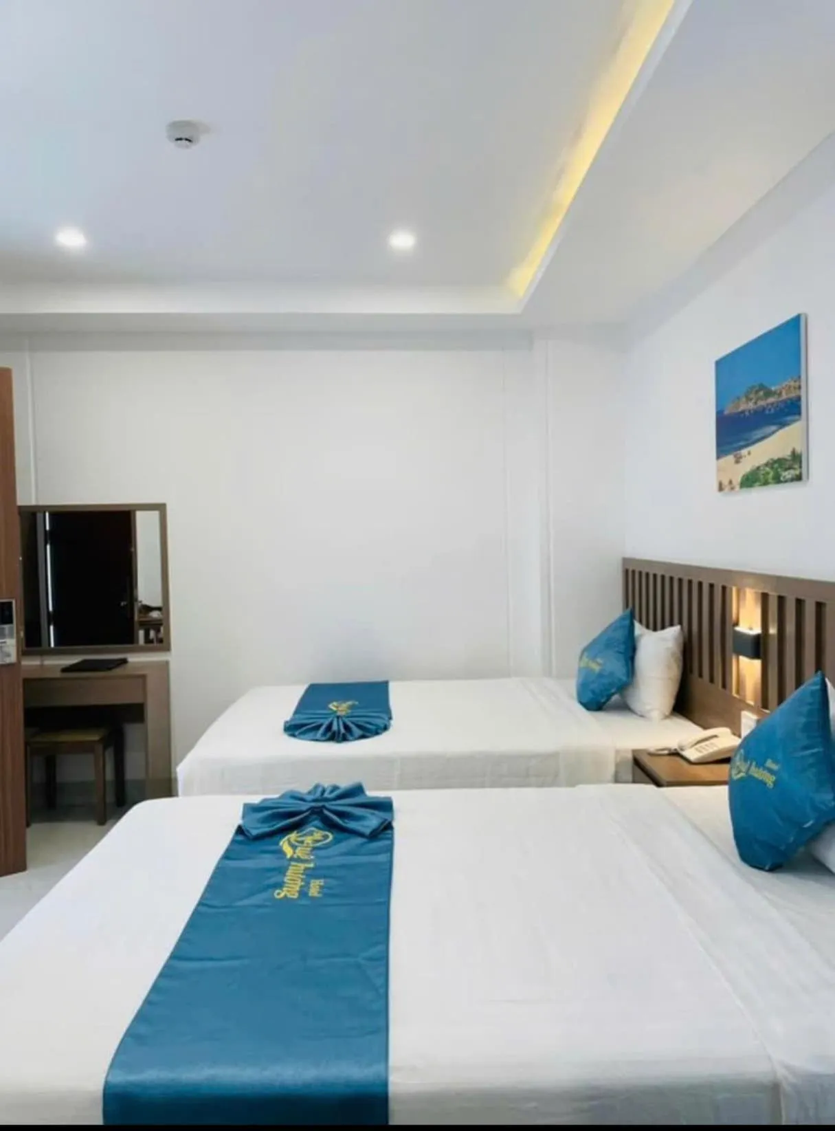 Bed in QUE HUONG HOTEL