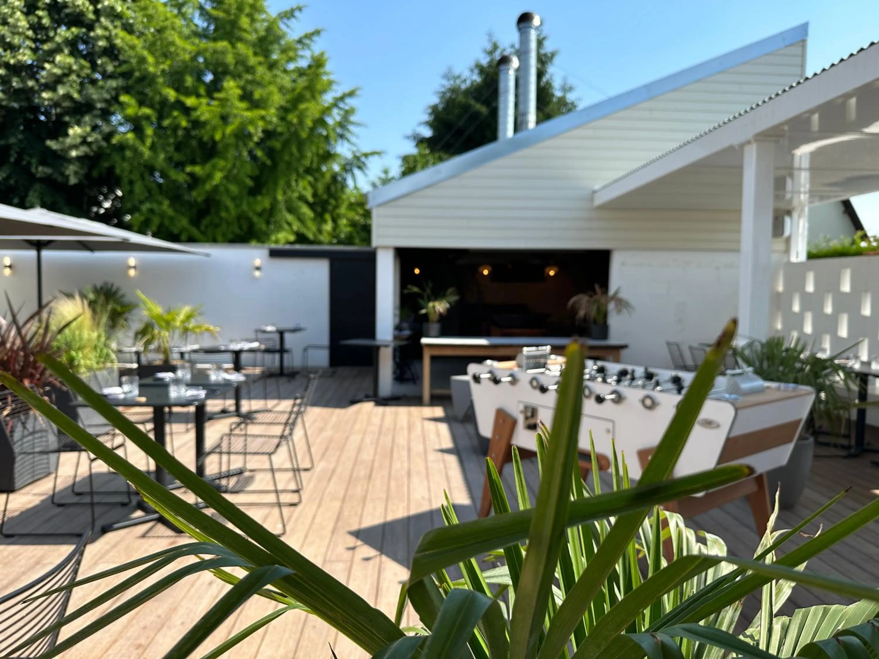 Patio in Logis Hôtel & Restaurant Le Vert Bocage