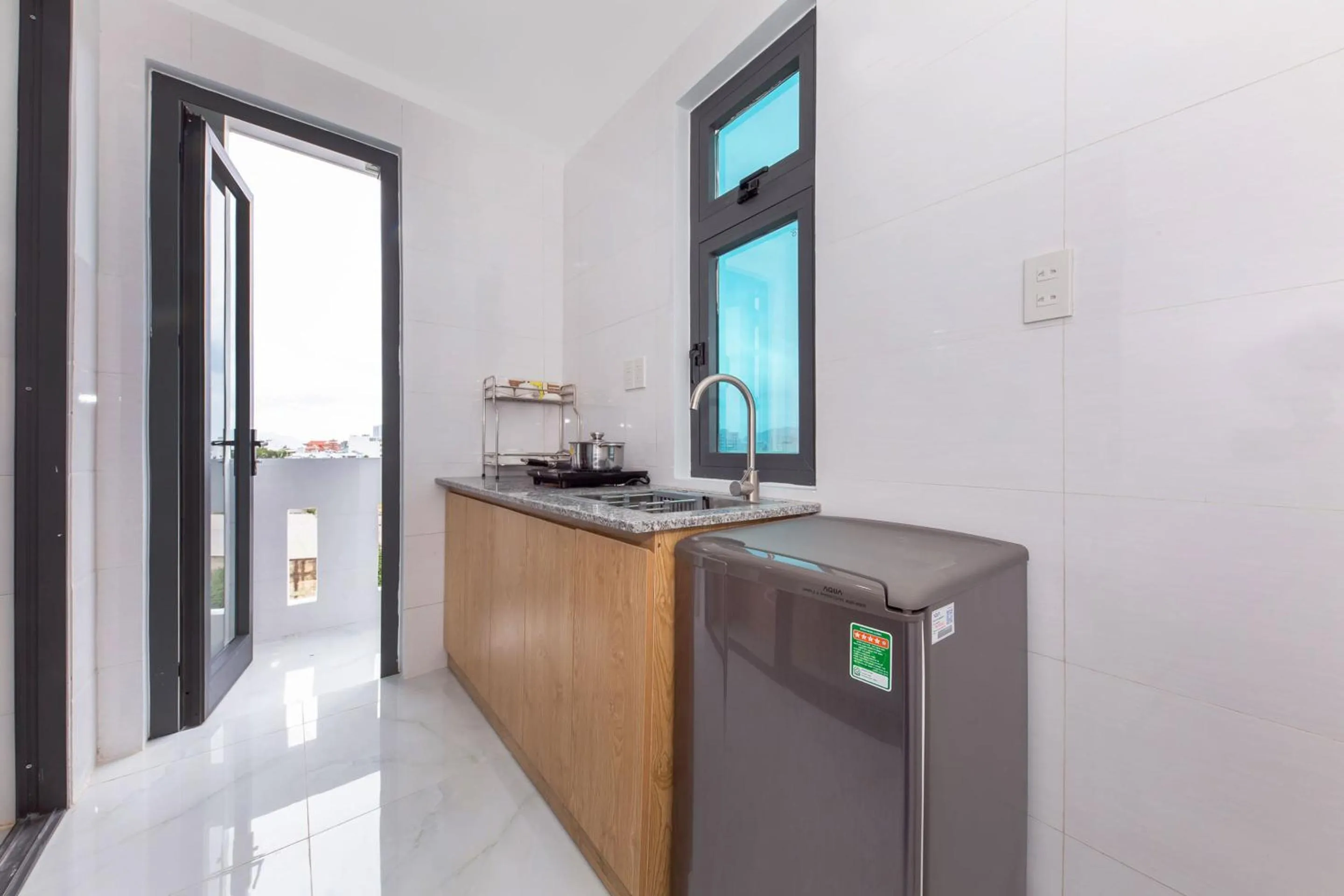 Kitchen or kitchenette in OYO 942 Cuong Hai Apartment