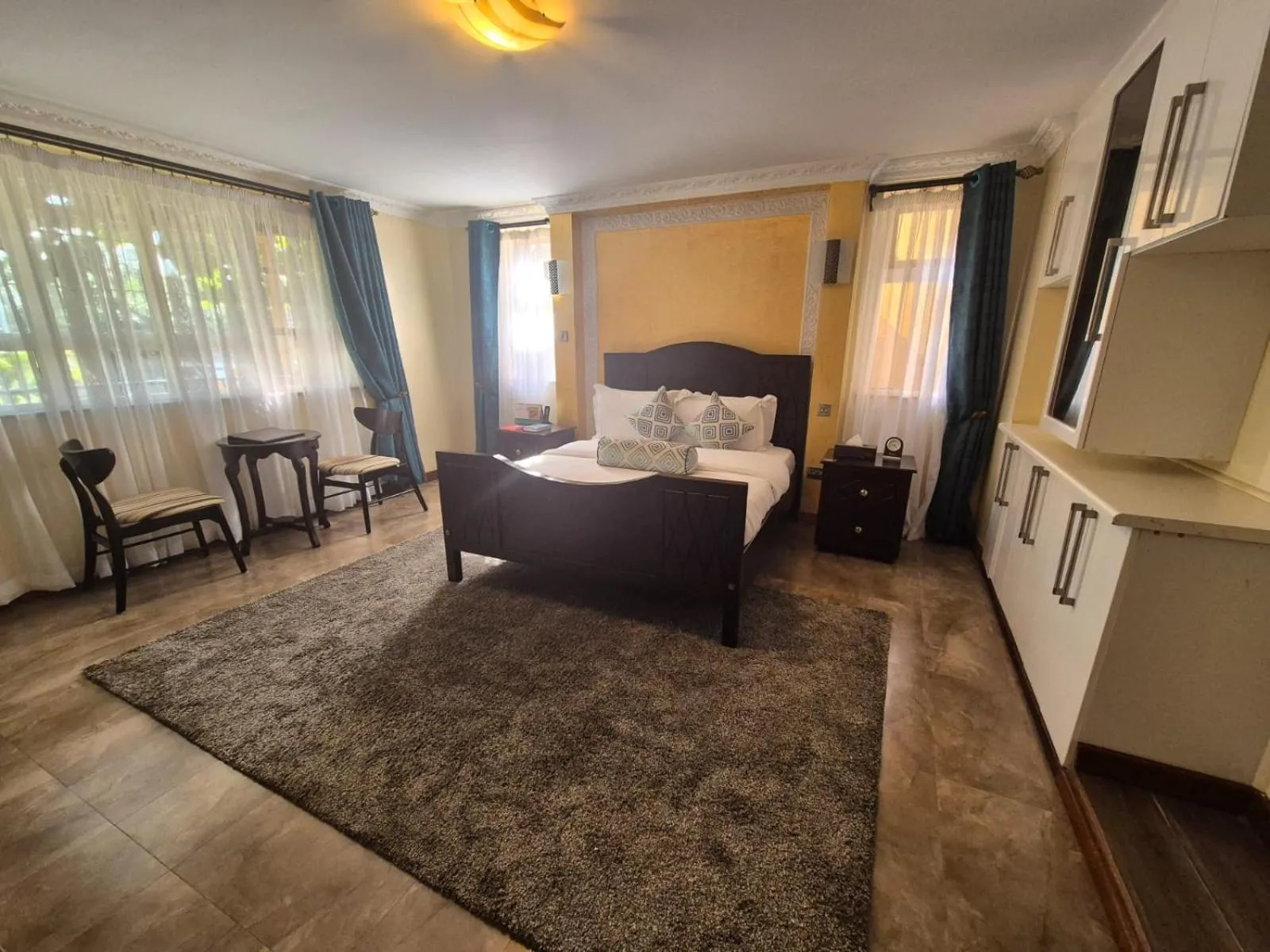 Seating area, Bed in Asyana Gardens