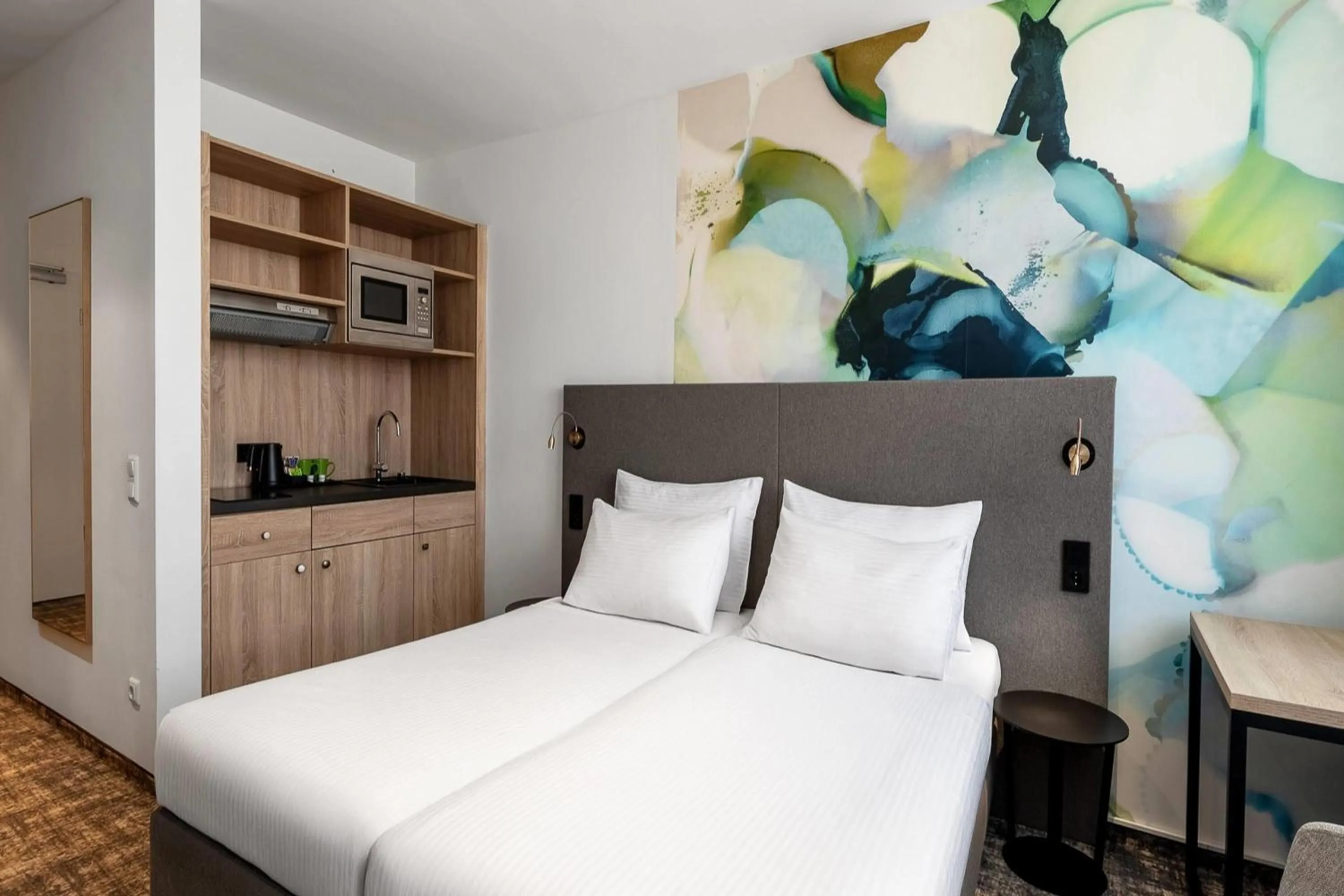 Photo of the whole room, Bed in Wyndham Garden Munich Messe