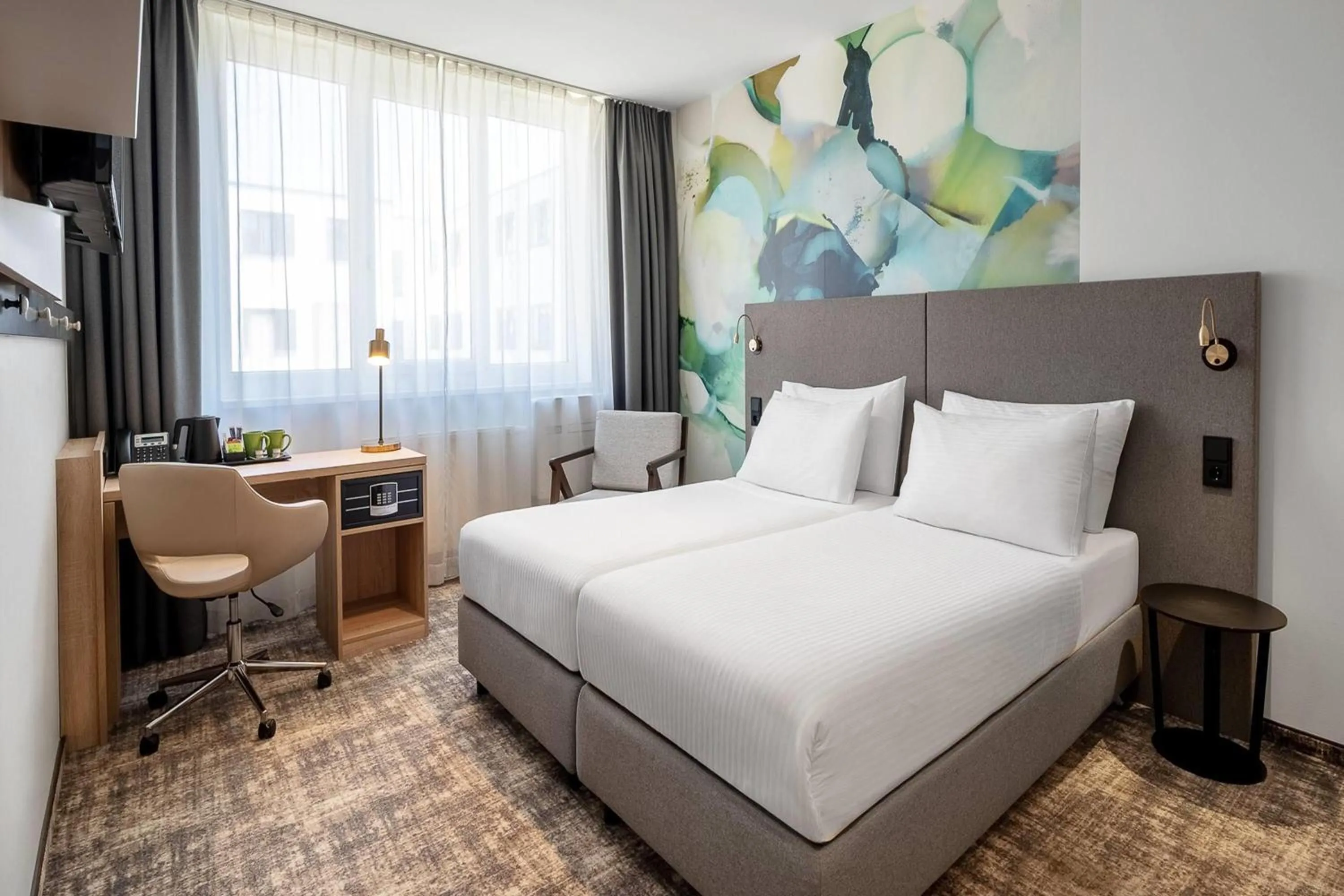 Photo of the whole room, Bed in Wyndham Garden Munich Messe