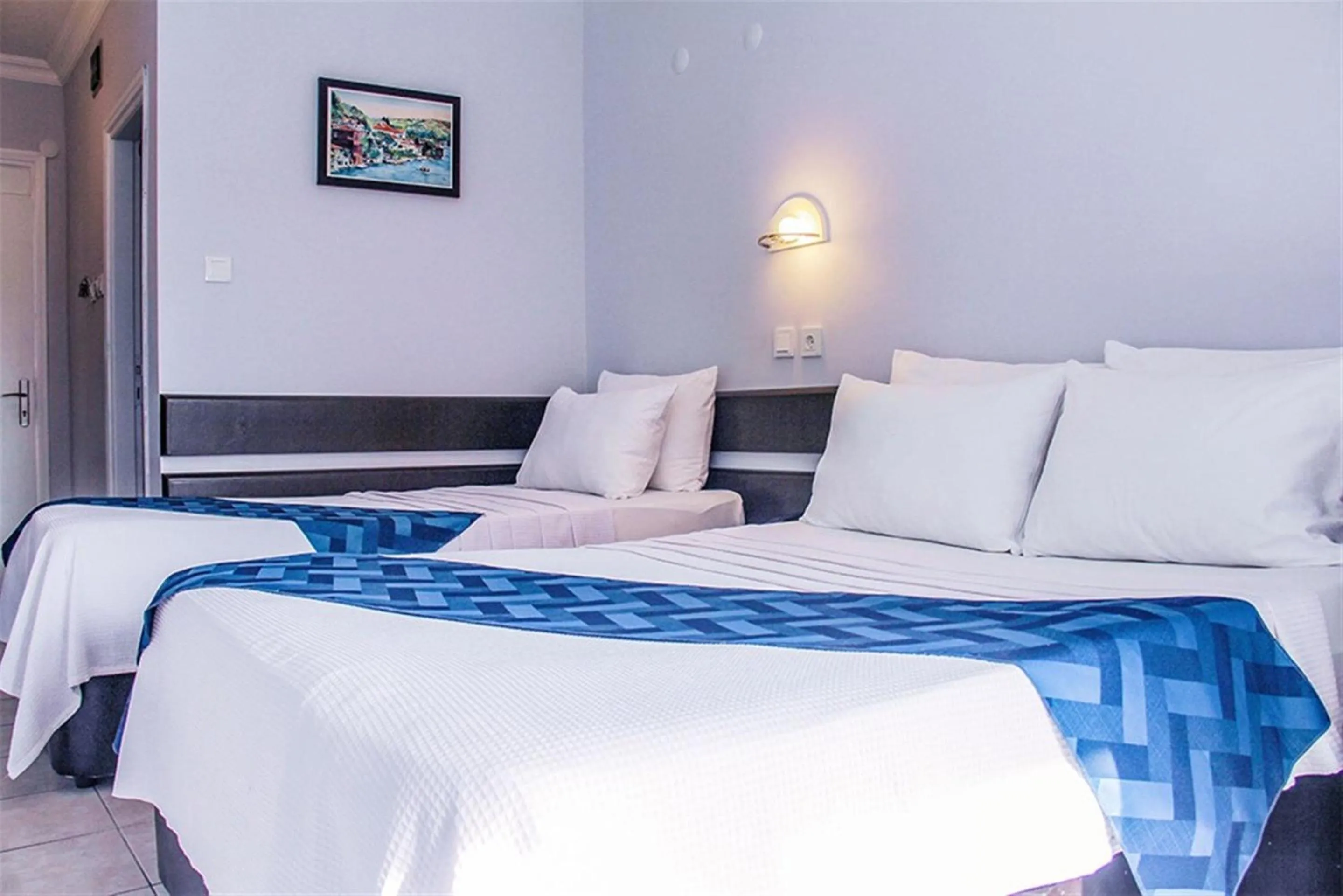 Bed in Yaman Life Hotel