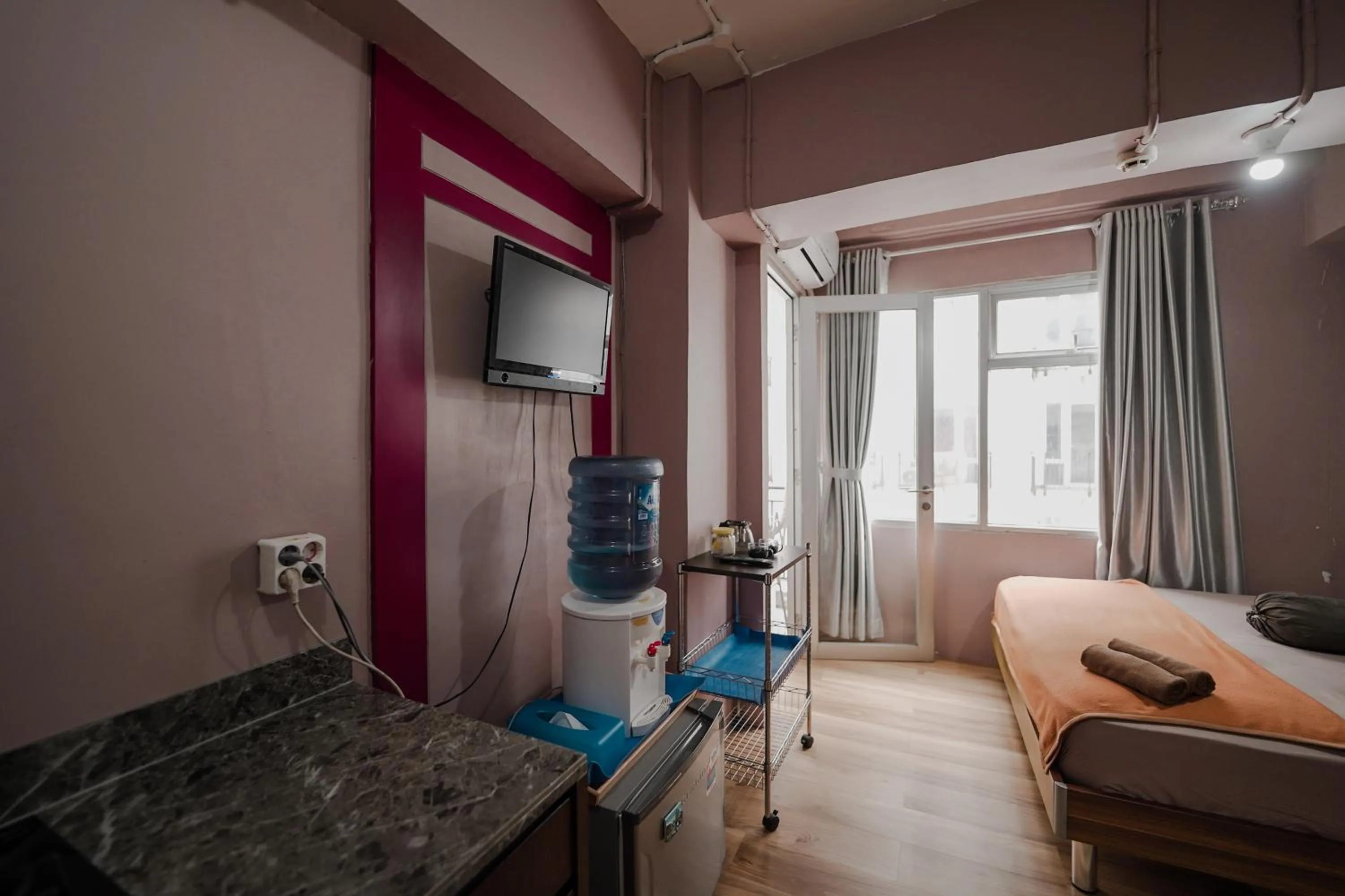 Bed in The Jarrdin by Bethania Pro