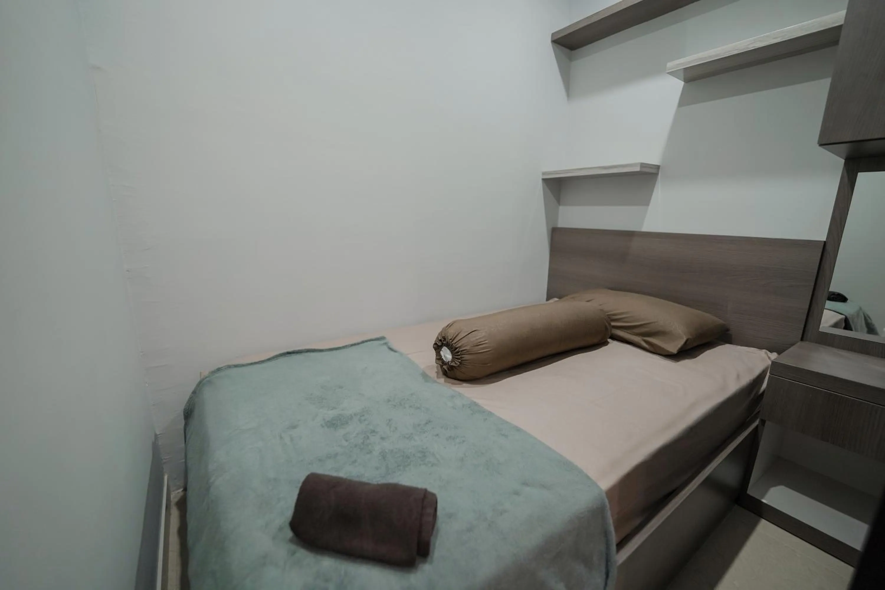 Bed in The Jarrdin by Bethania Pro