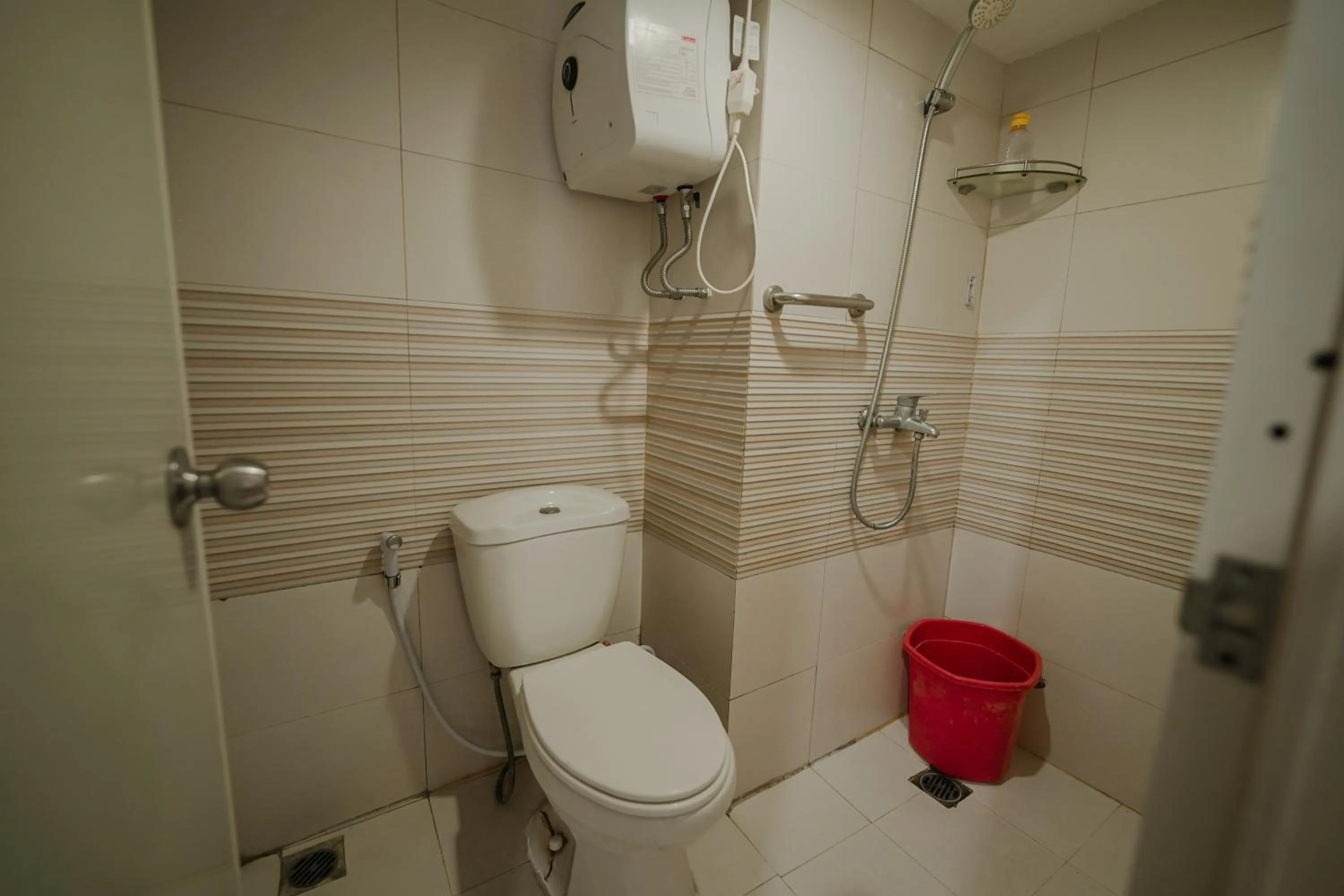 Toilet in The Jarrdin by Bethania Pro