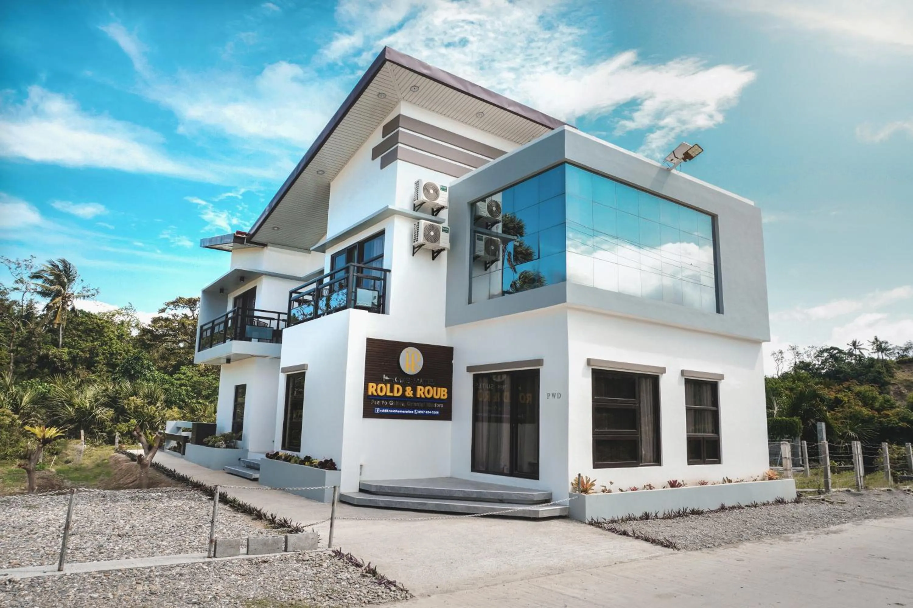 Property building in Rold and Roub Home Suites powered by Cocotel