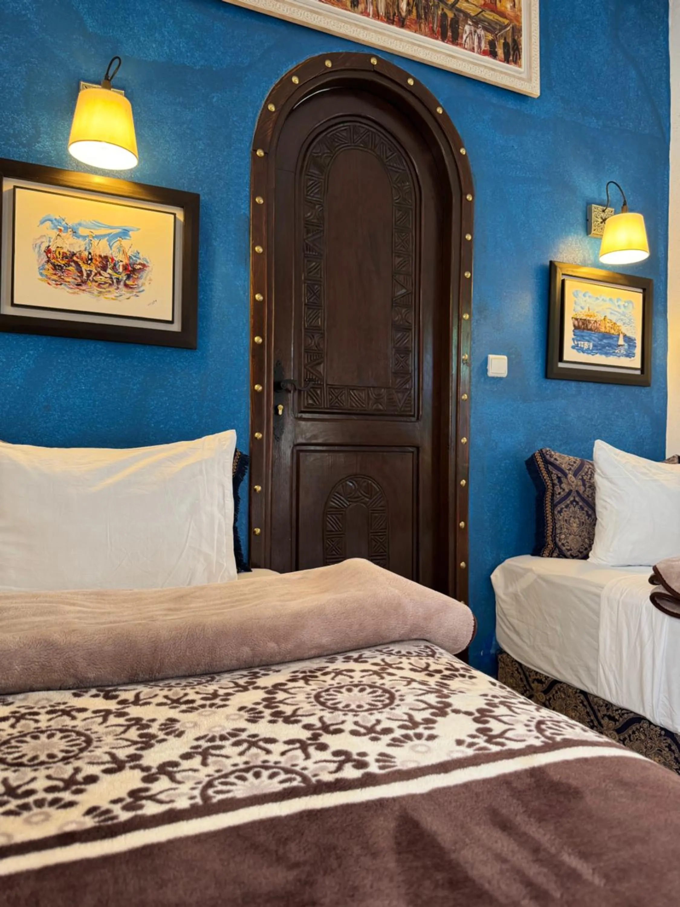 Bed in RIAD ESMERALDA By Dar Ouezzani