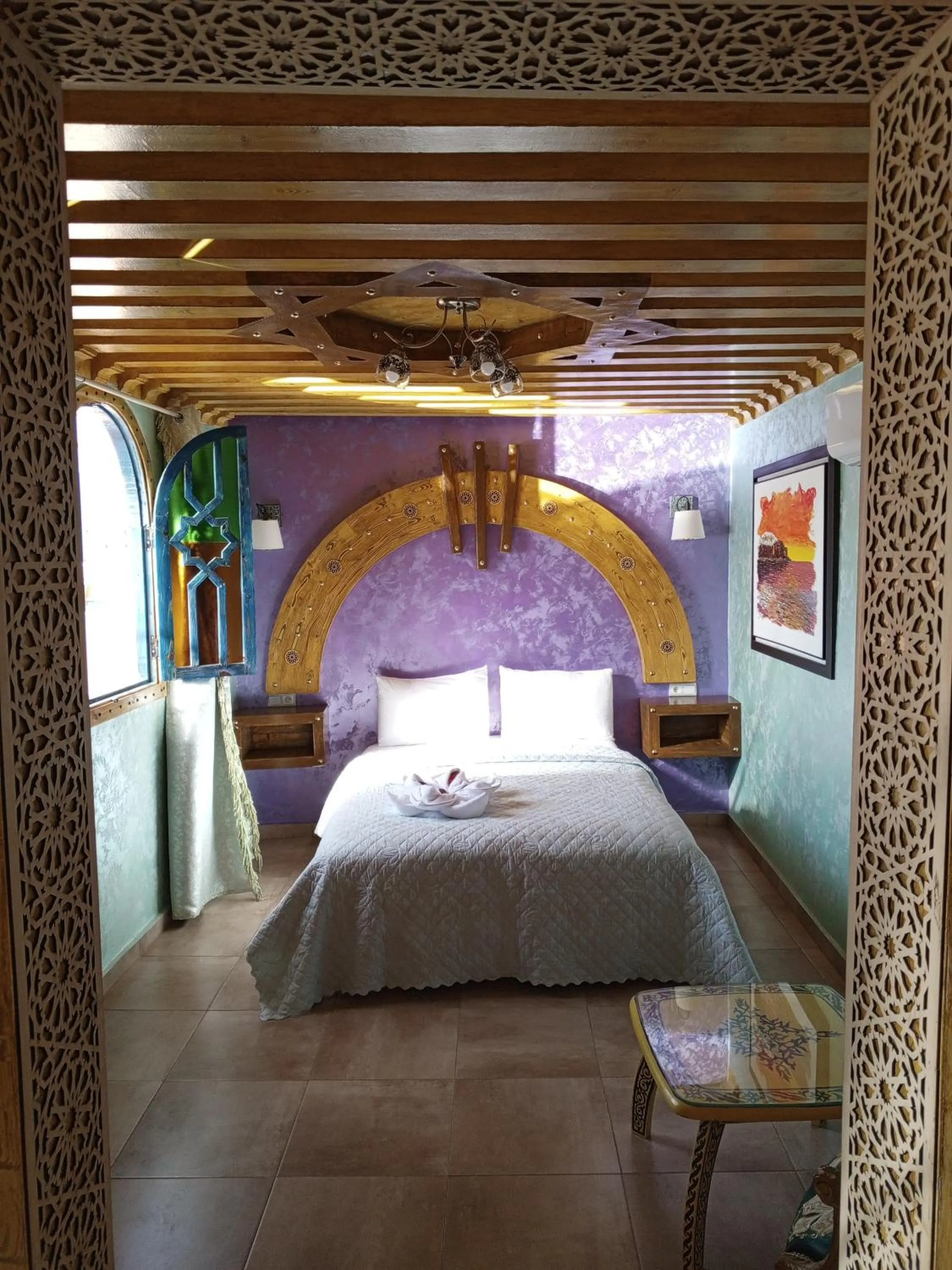 Bed in RIAD ESMERALDA By Dar Ouezzani