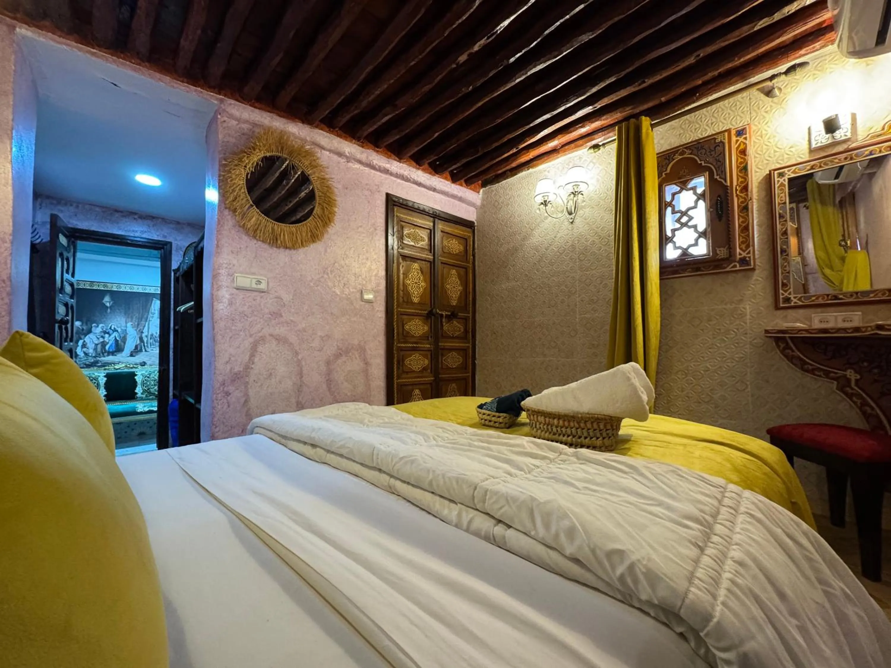Bed in RIAD ESMERALDA By Dar Ouezzani