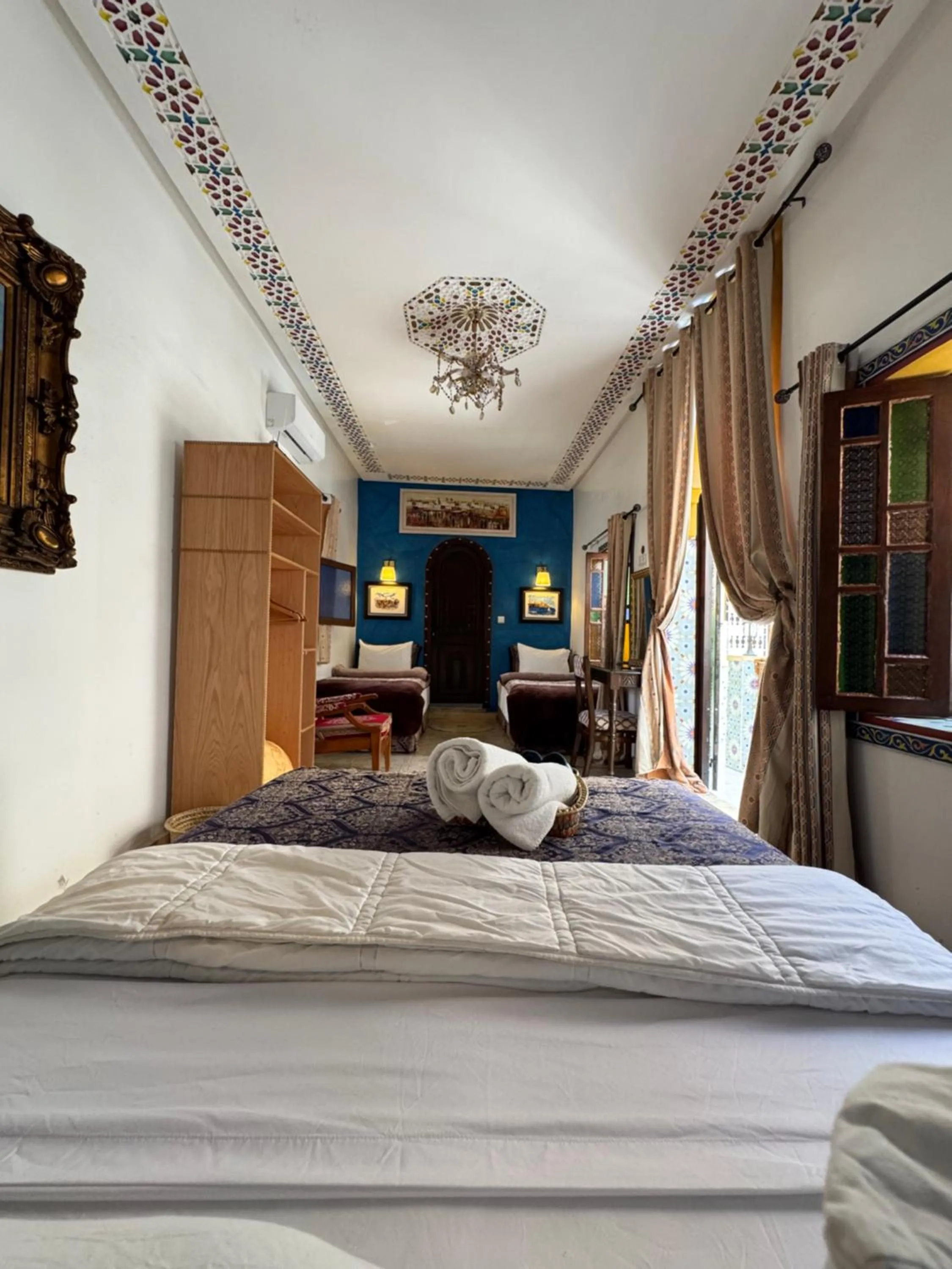 Bed in RIAD ESMERALDA By Dar Ouezzani