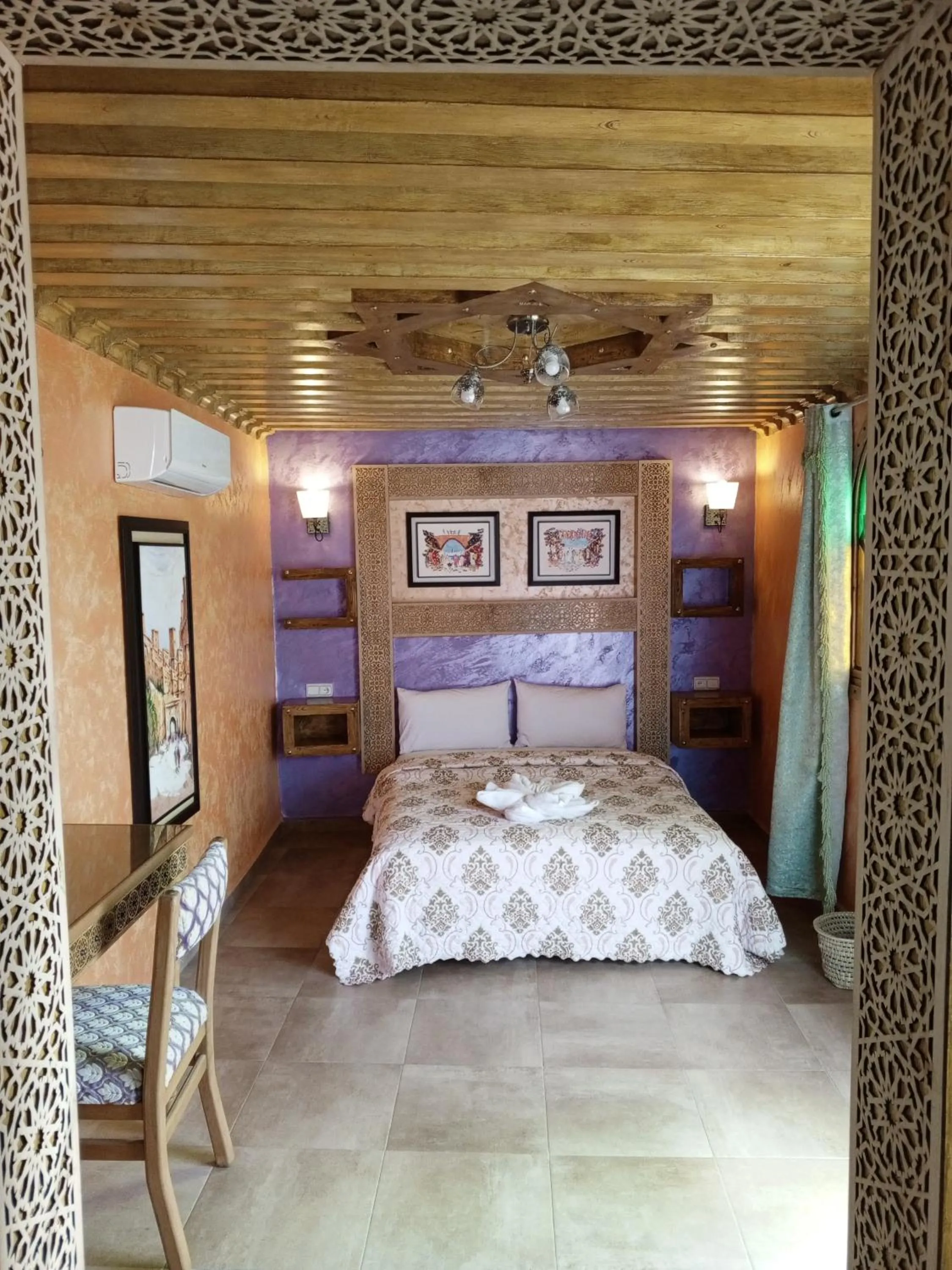 Bed in RIAD ESMERALDA By Dar Ouezzani