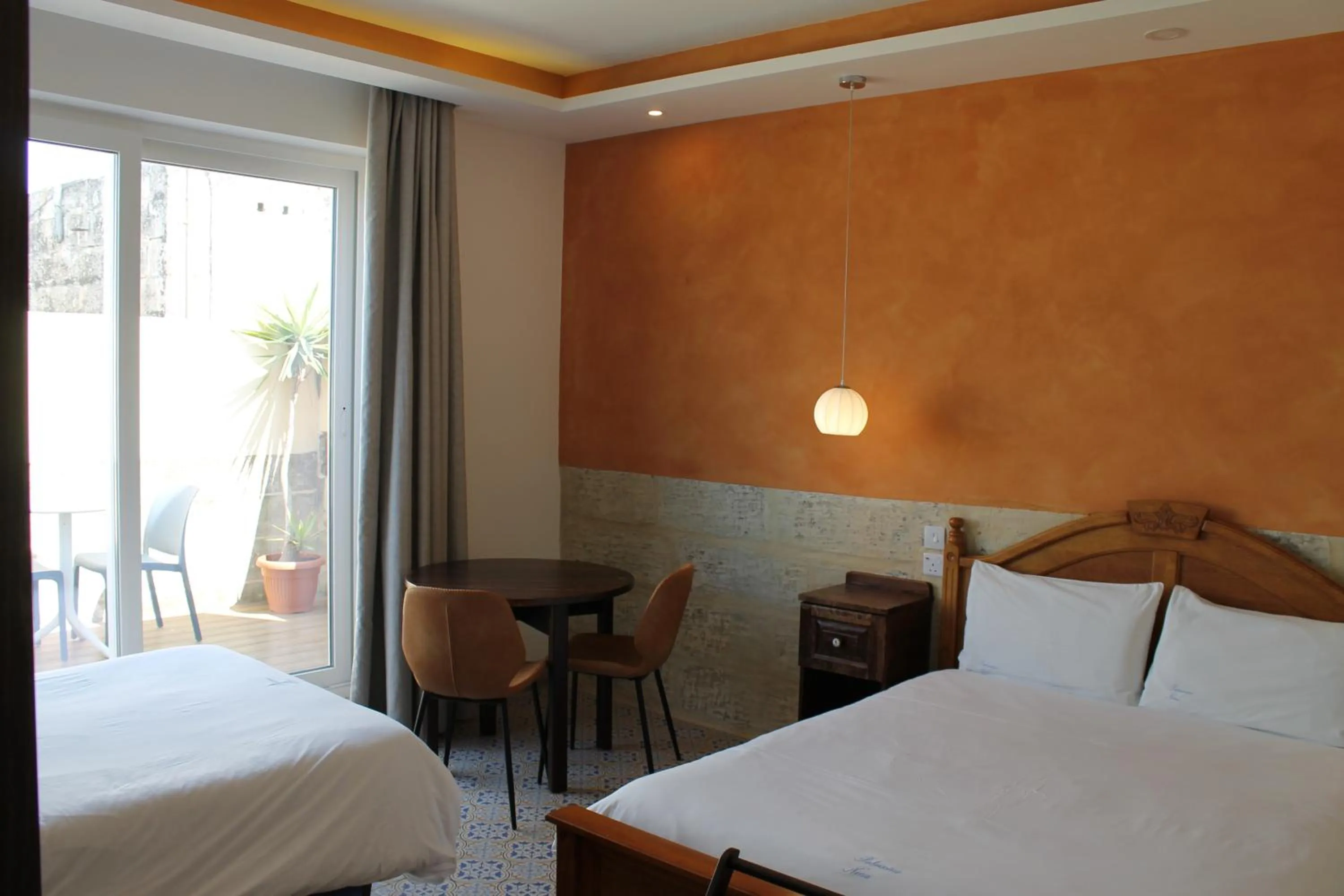 Bed in Palazzino Nina Boutique Hotel