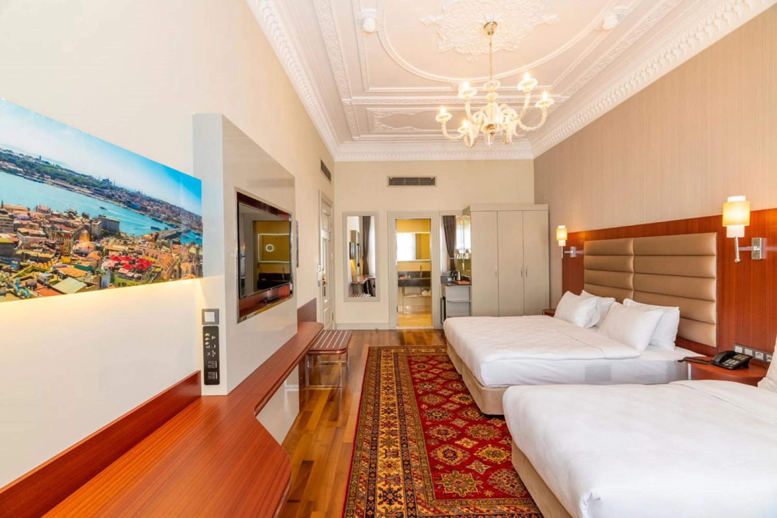 Bed in Blue Gilroy Hotel