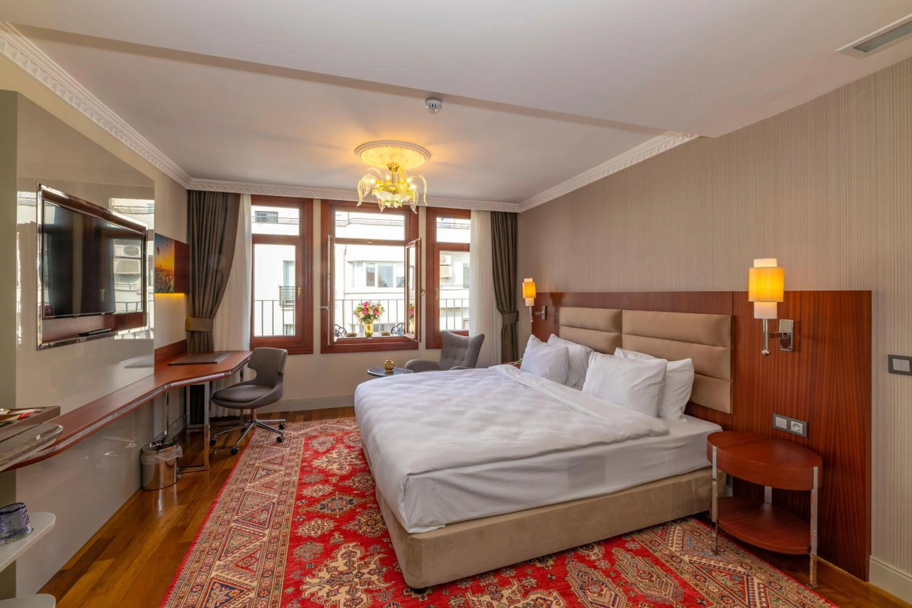 Bed in Blue Gilroy Hotel