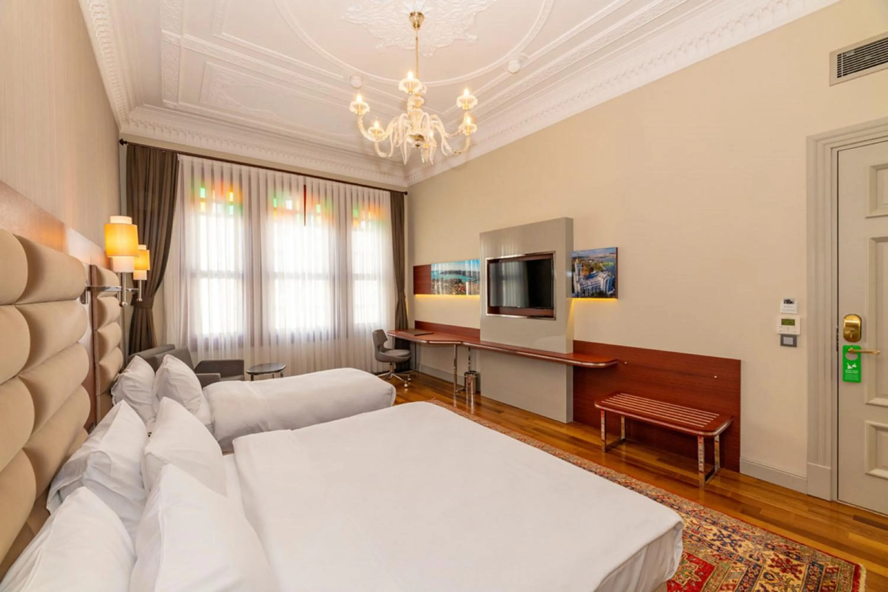 Bed in Blue Gilroy Hotel