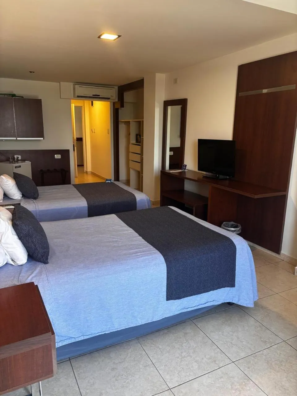 Bed in Puerto Amarras Hotel & Suites