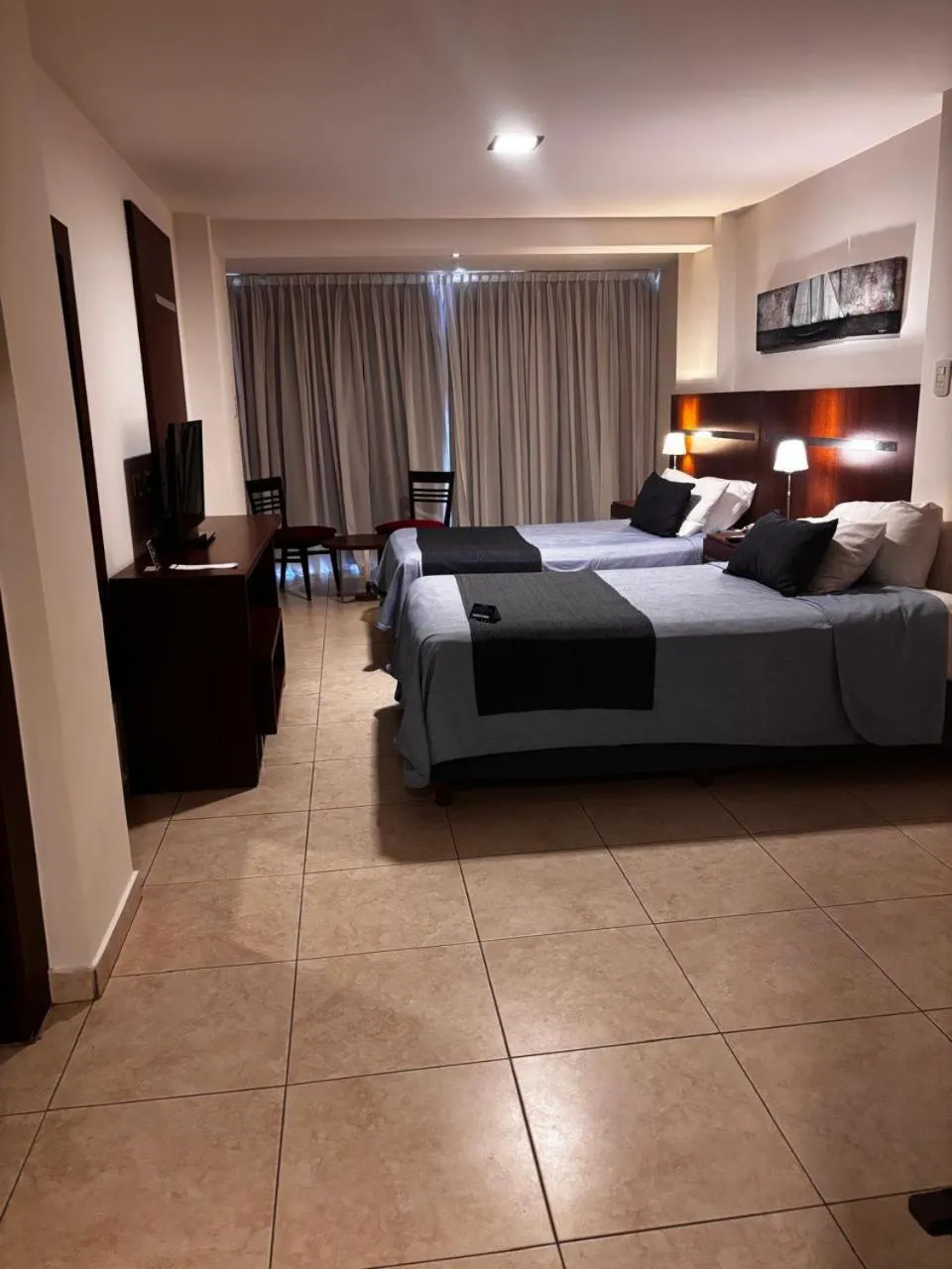 Bed in Puerto Amarras Hotel & Suites