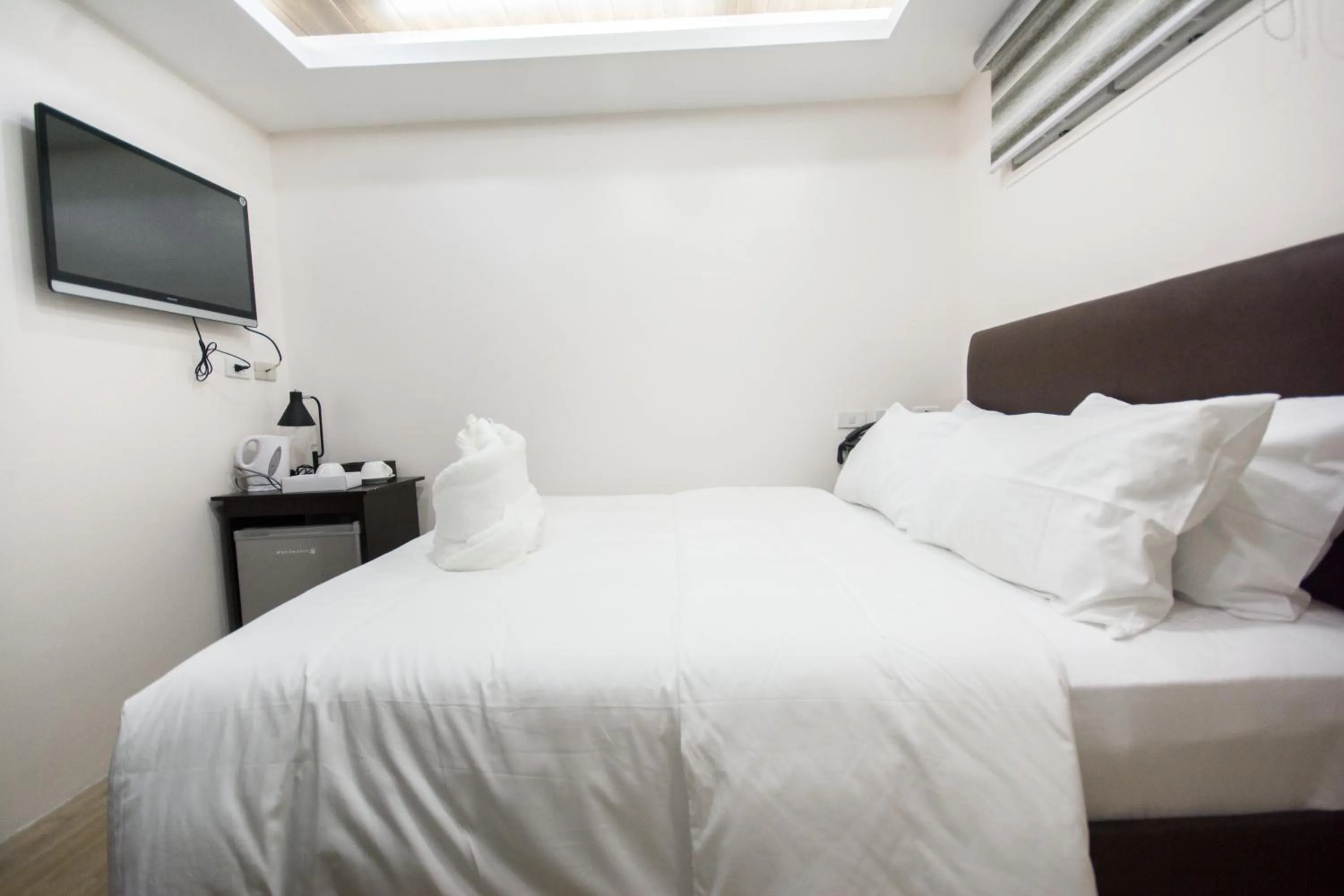 Bed in Emerald Island Hotel