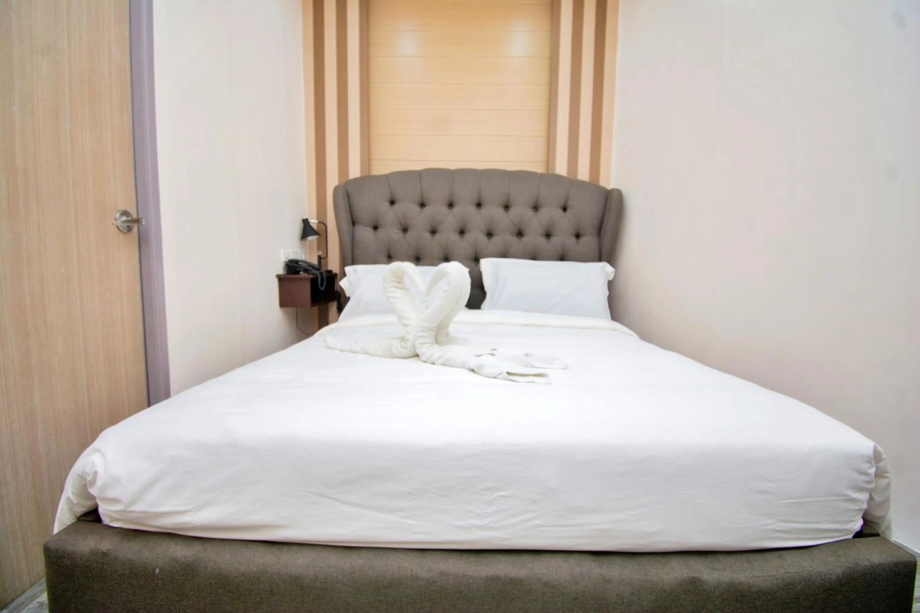 Bed in Emerald Island Hotel