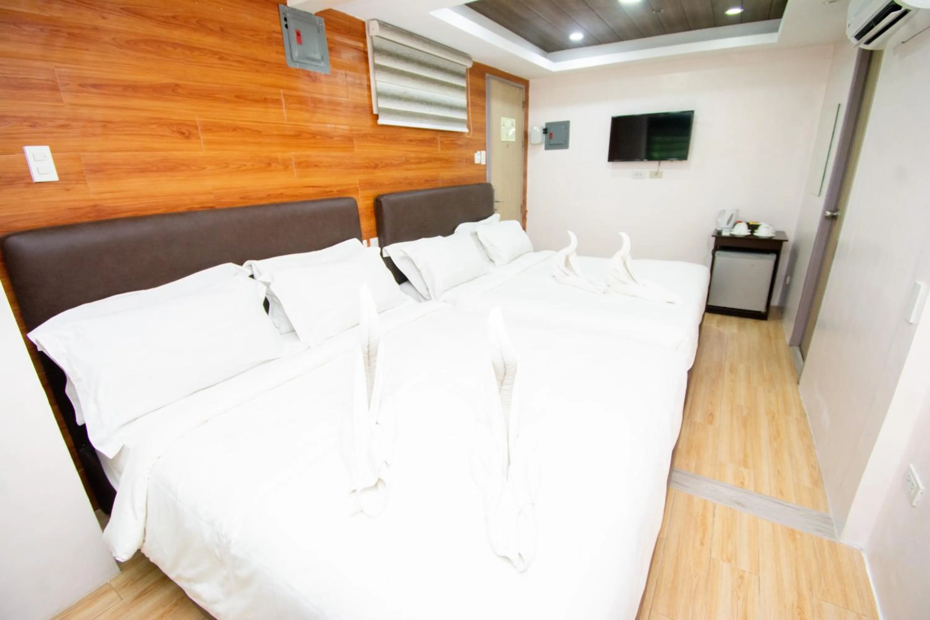 Bed in Emerald Island Hotel