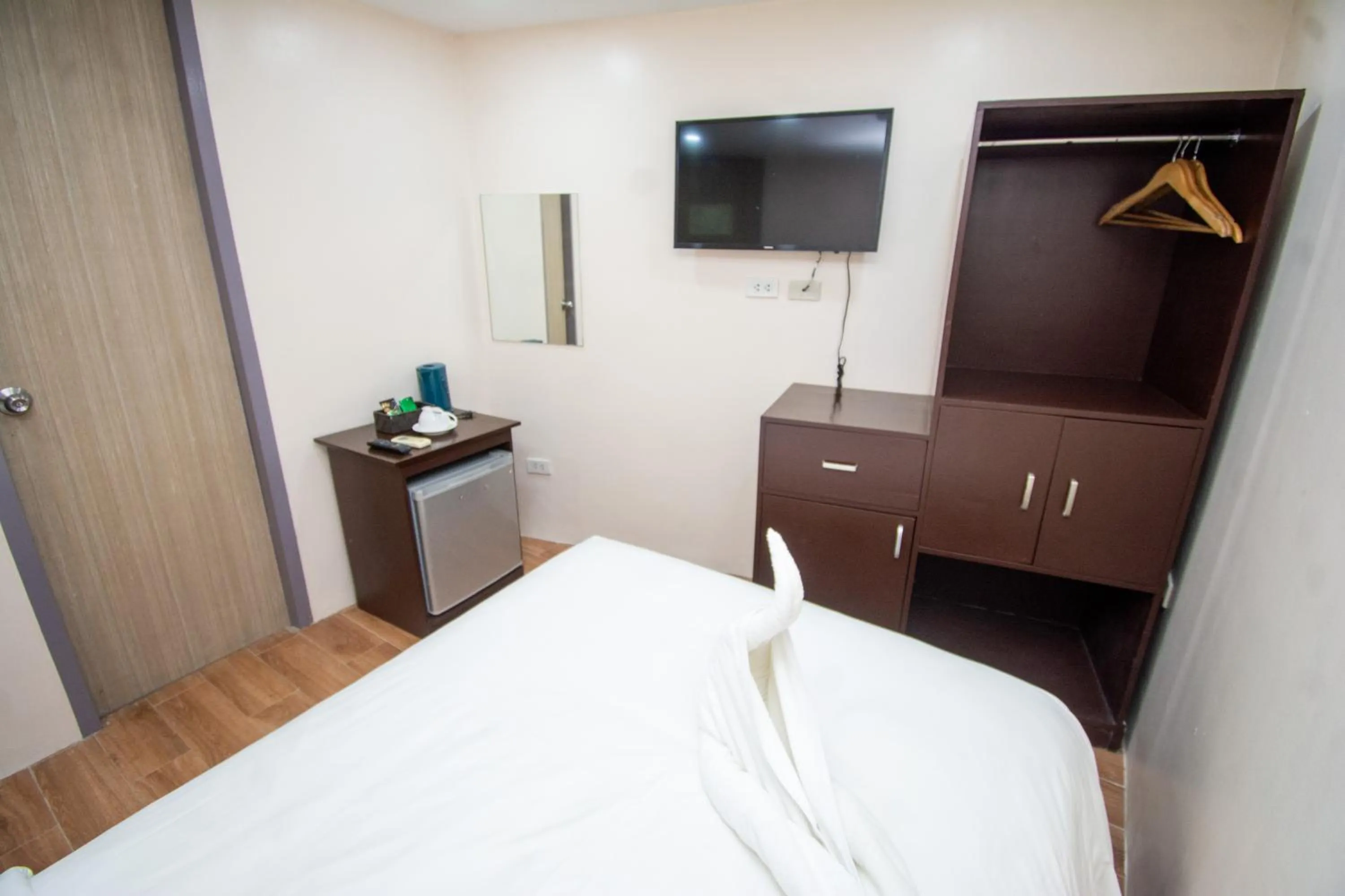 Bed in Emerald Island Hotel