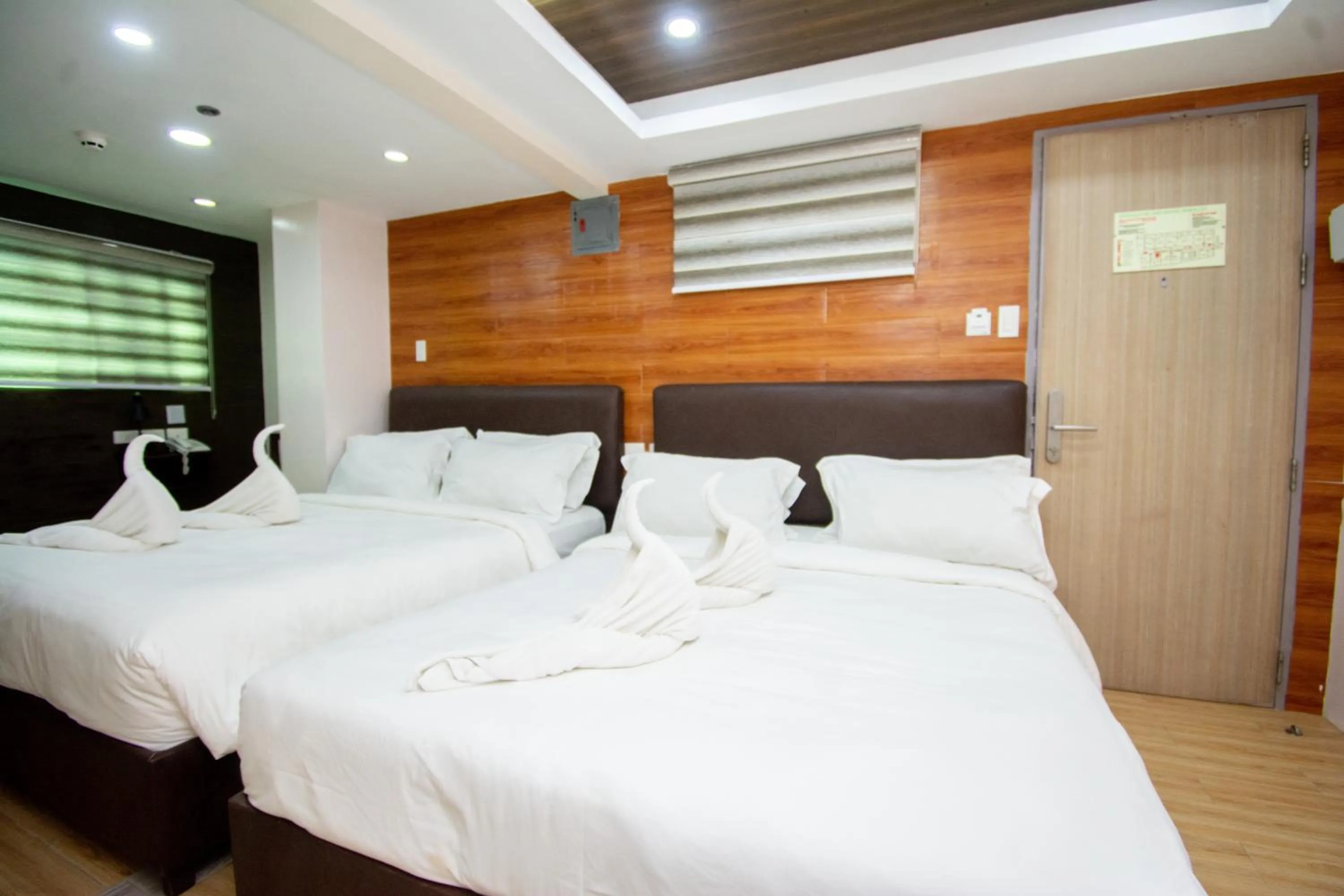 Bed in Emerald Island Hotel