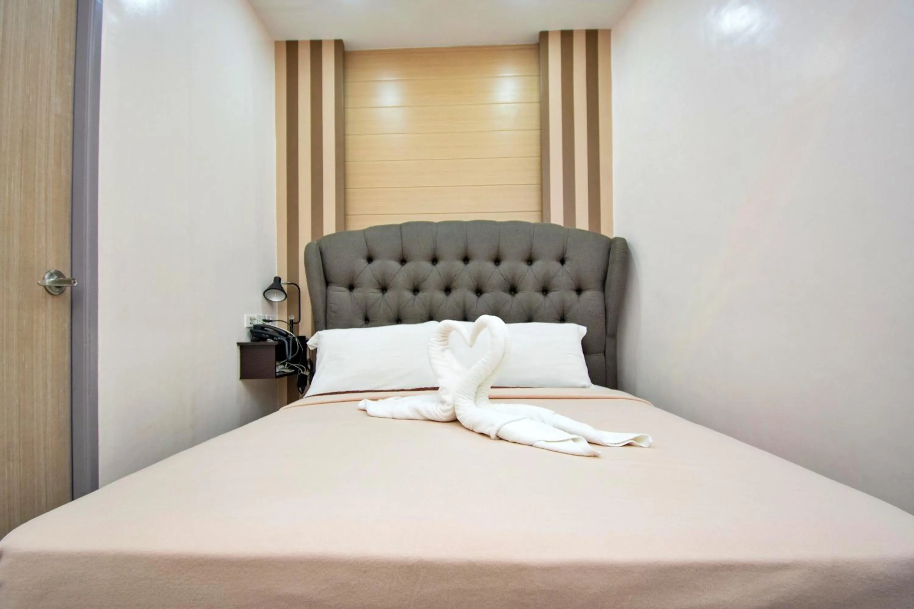 Bed in Emerald Island Hotel