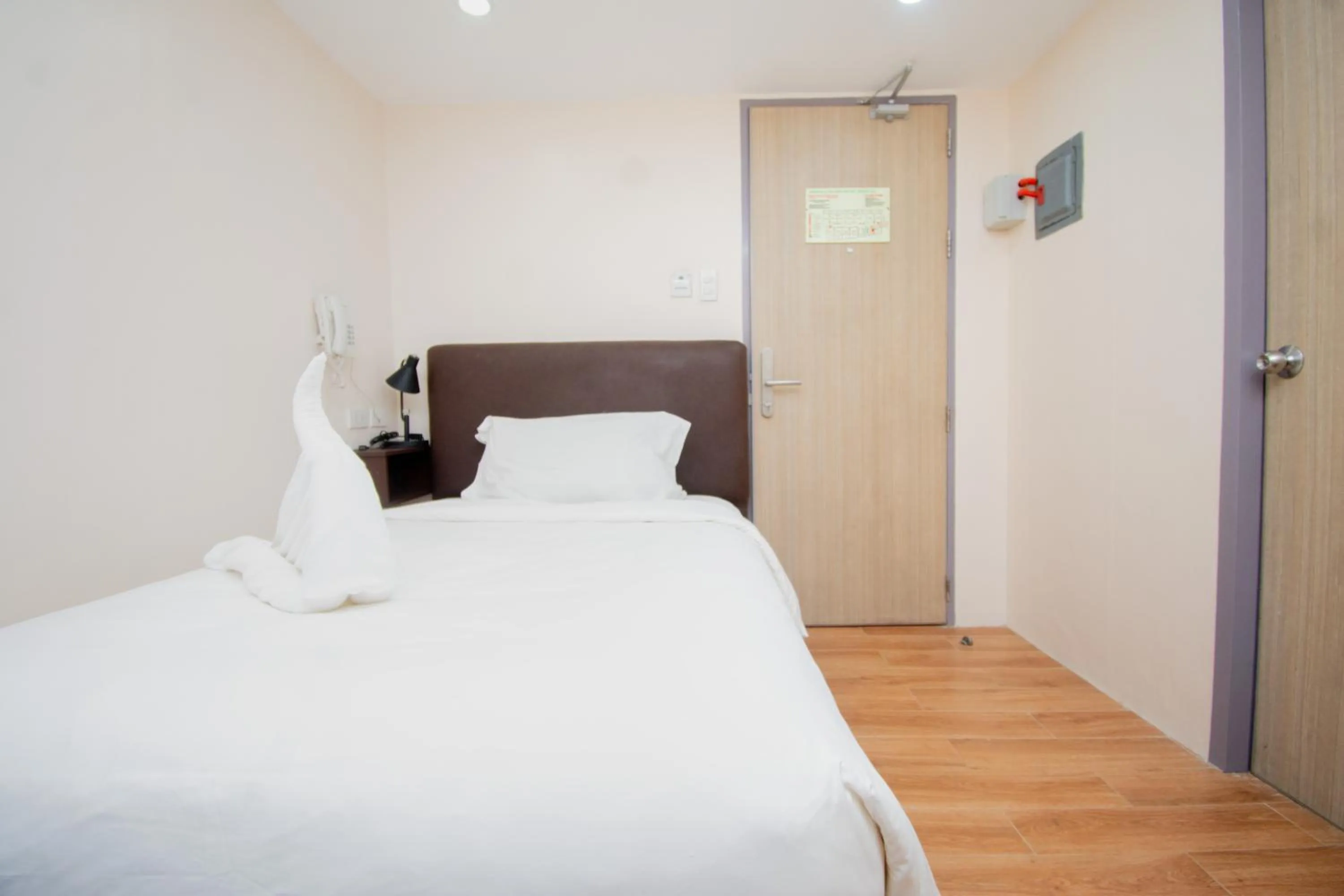 Bed in Emerald Island Hotel