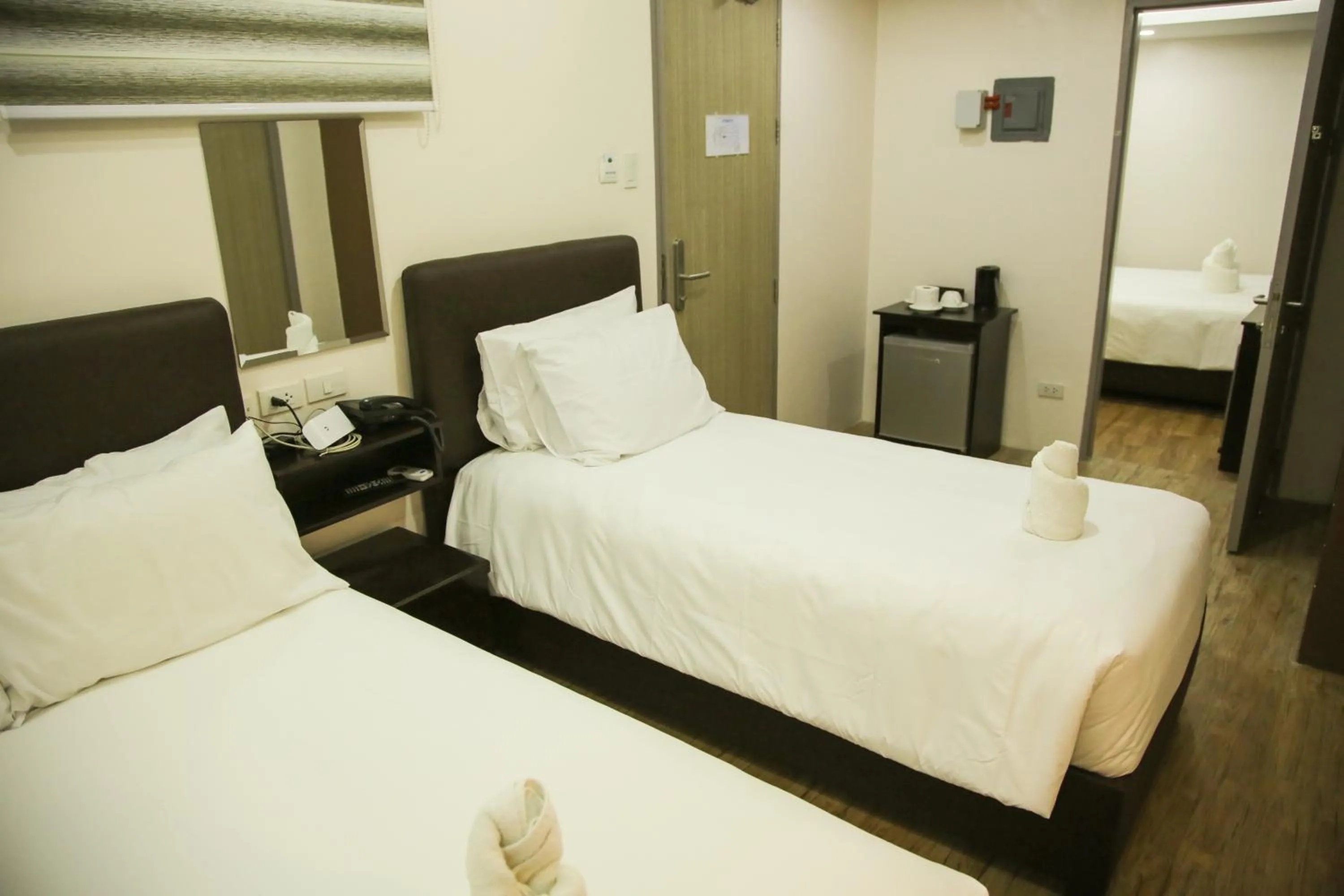 Bed in Emerald Island Hotel