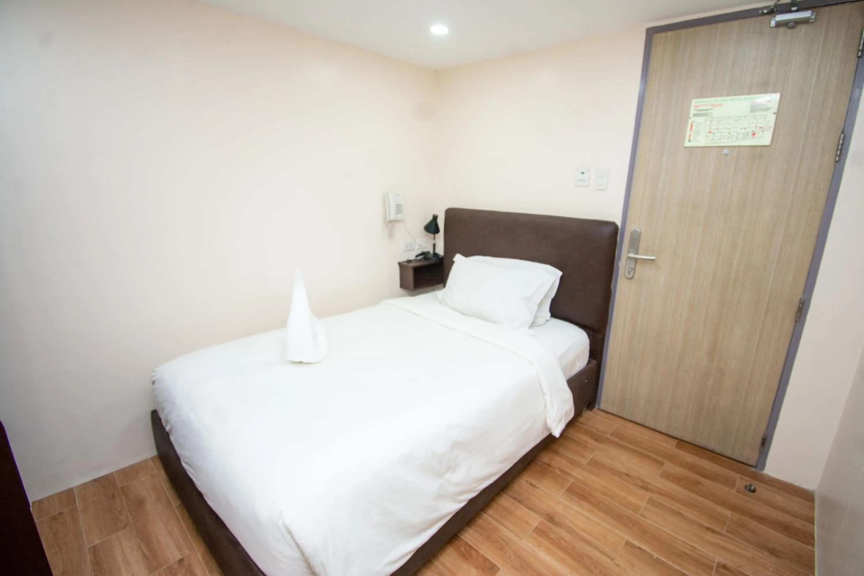 Bed in Emerald Island Hotel