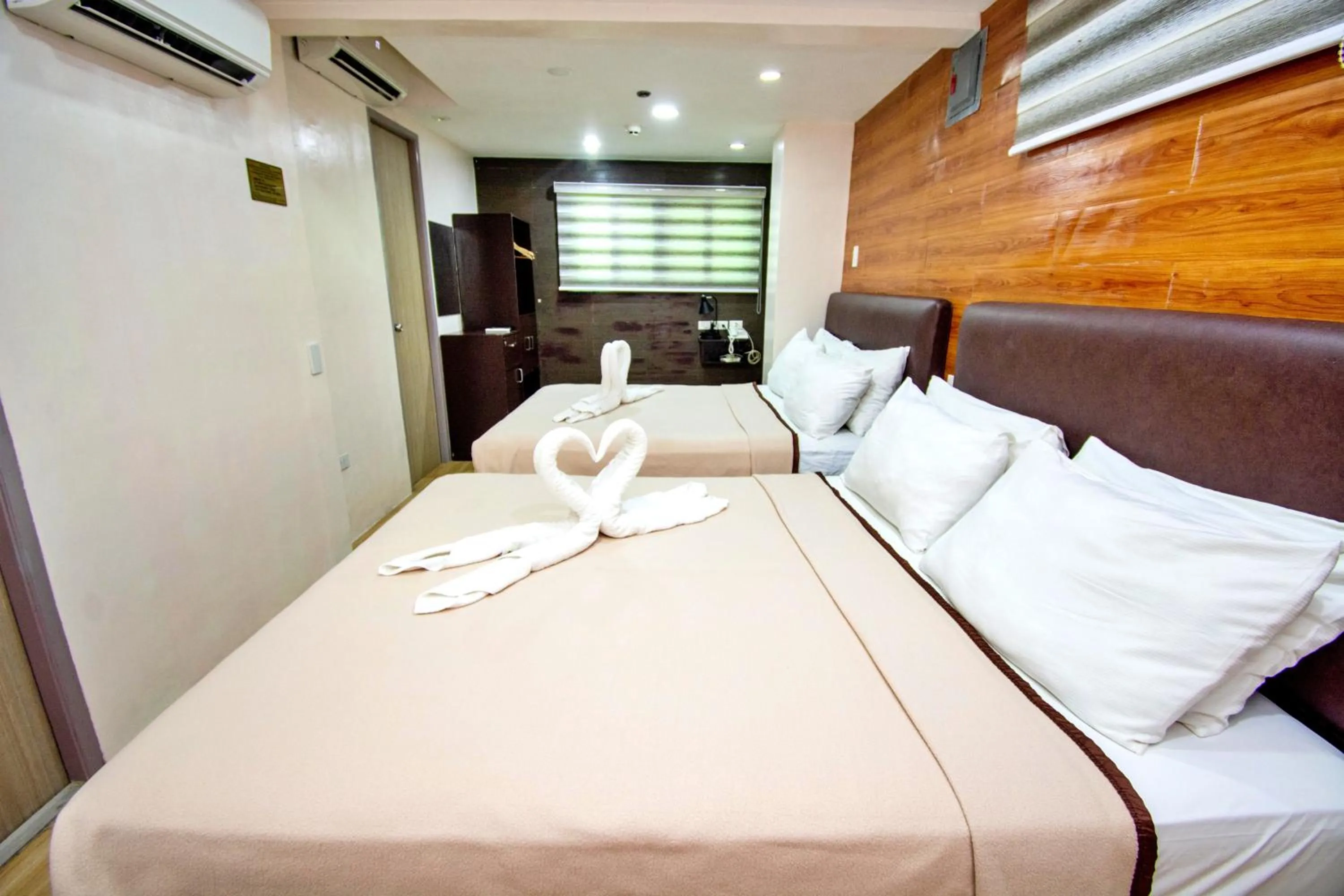 Bed in Emerald Island Hotel