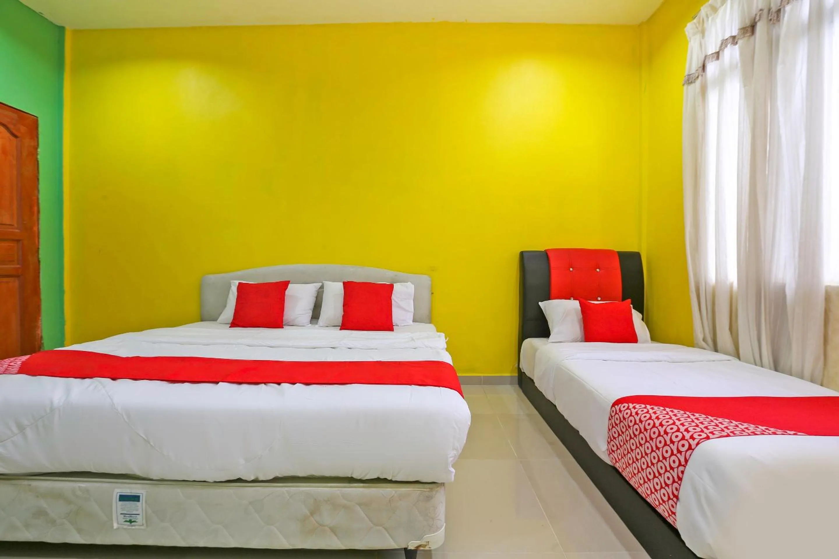 Bedroom, Bed in OYO 89933 Nun Hotel