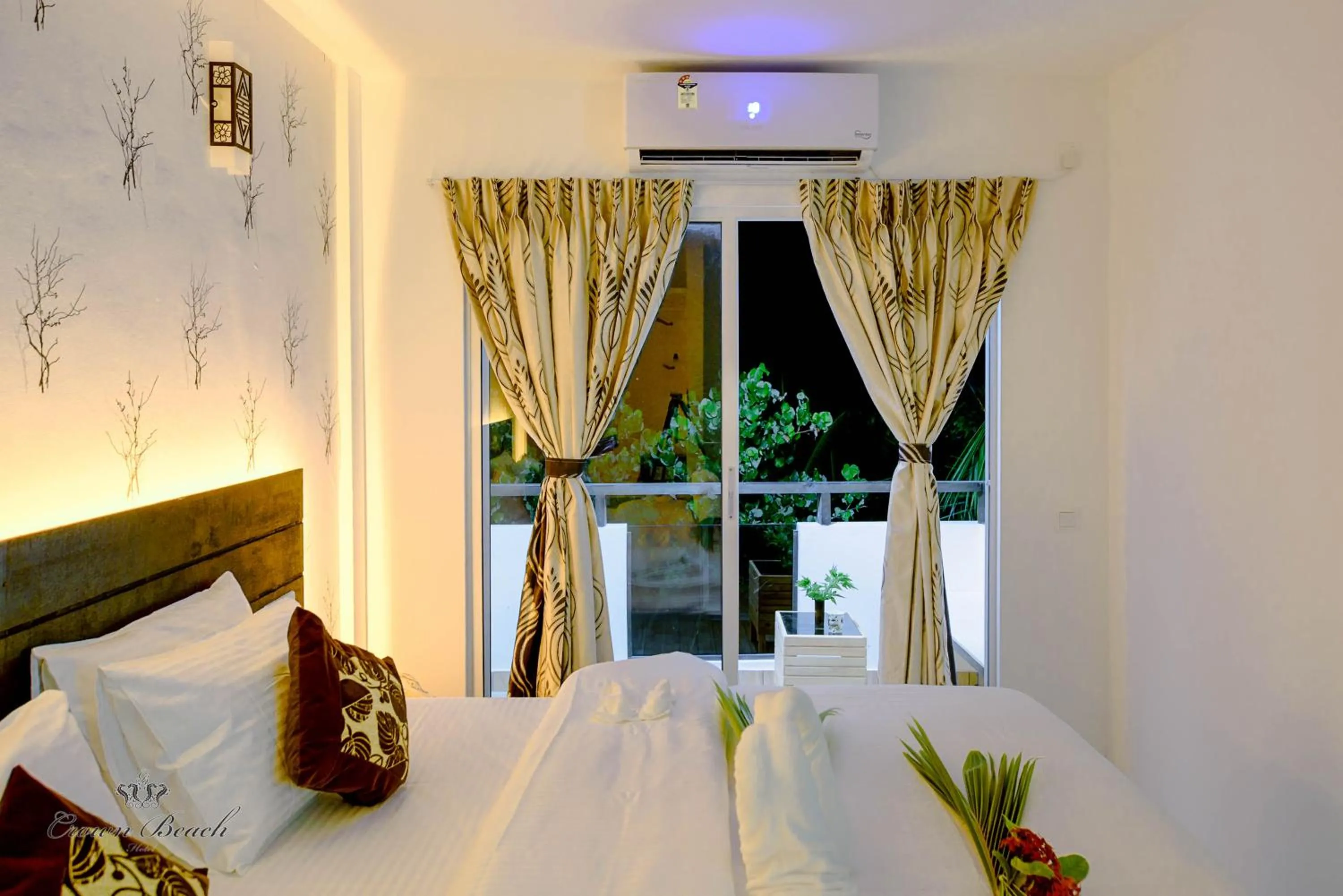 Bed in Crown Beach Villas -Private Beach