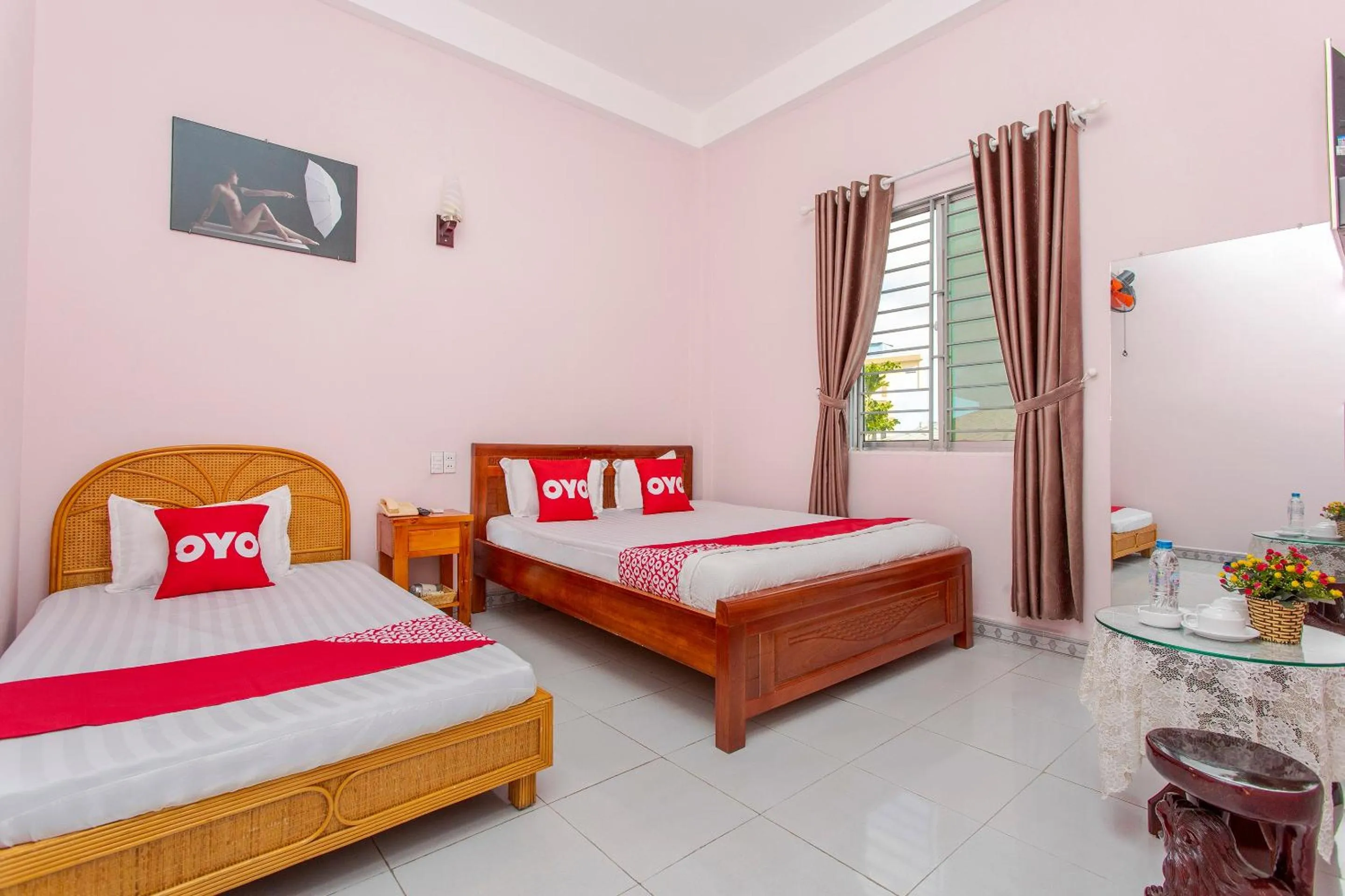 Bedroom in OYO 962 Tulip Motel