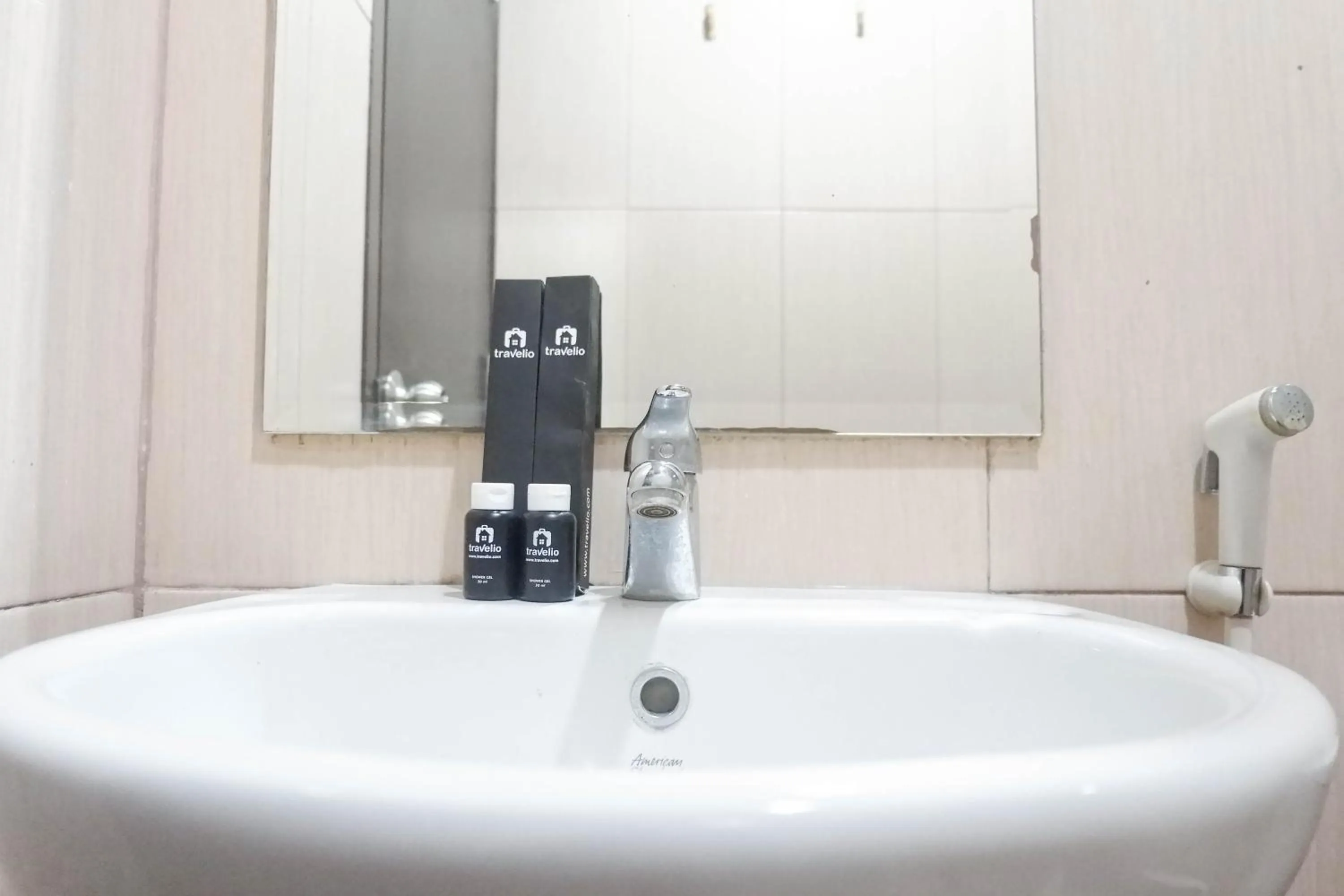 Minimalist 2BR Apartment at Tamansari Papilio By Travelio