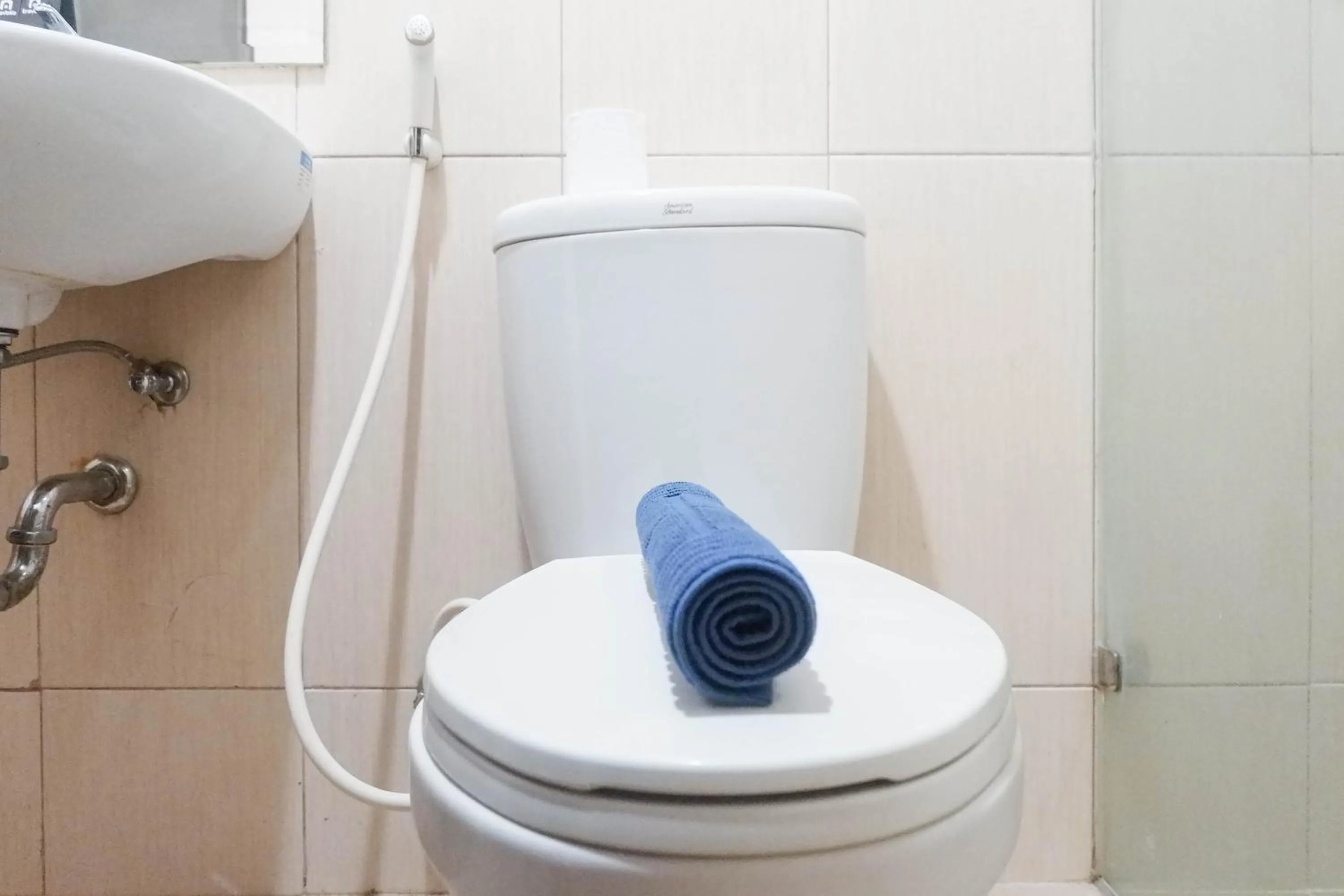 Minimalist 2BR Apartment at Tamansari Papilio By Travelio