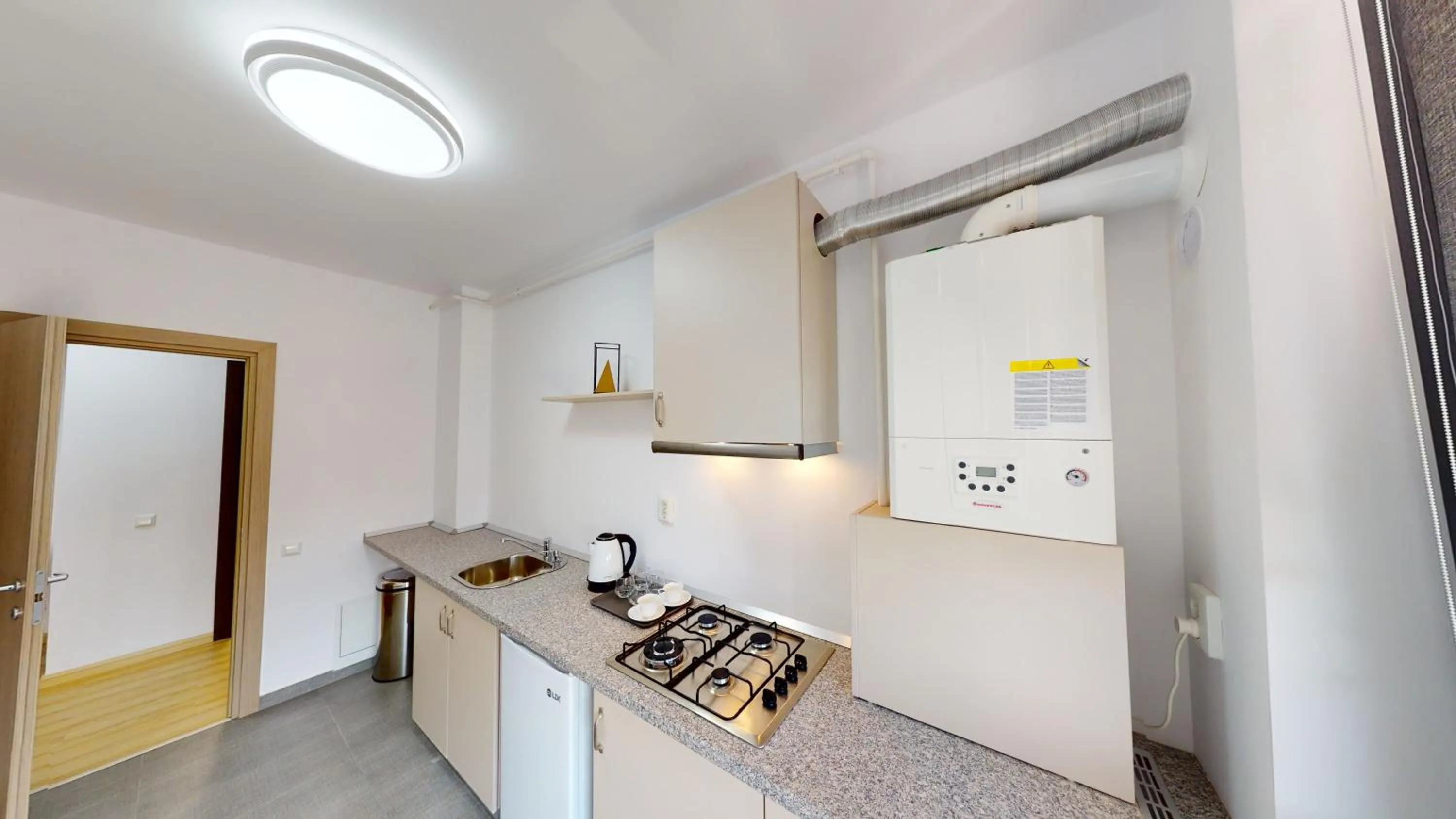 Kitchen or kitchenette in Le Blanc ApartHotel